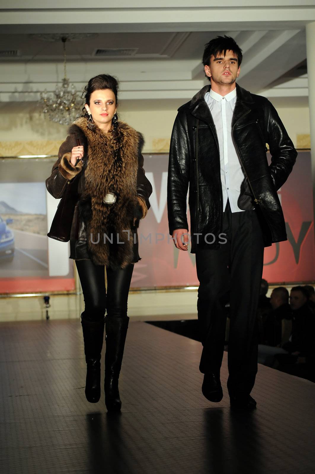 SIEDLCE, POLAND - NOVEMBER 19: models showcasing designs from Ochnik leather collection walk the catwalk at the Siedlce Fashion Evening on November 19, 2010 in Siedlce, Poland