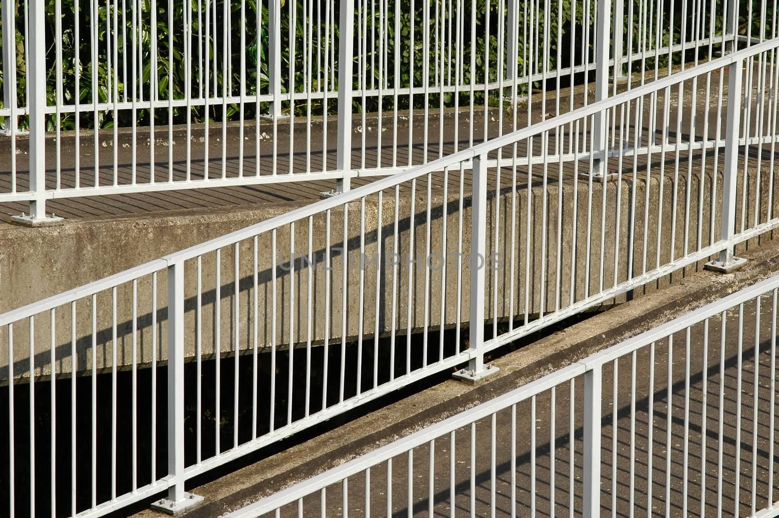 metal railings on a sloping pedestrian walkway