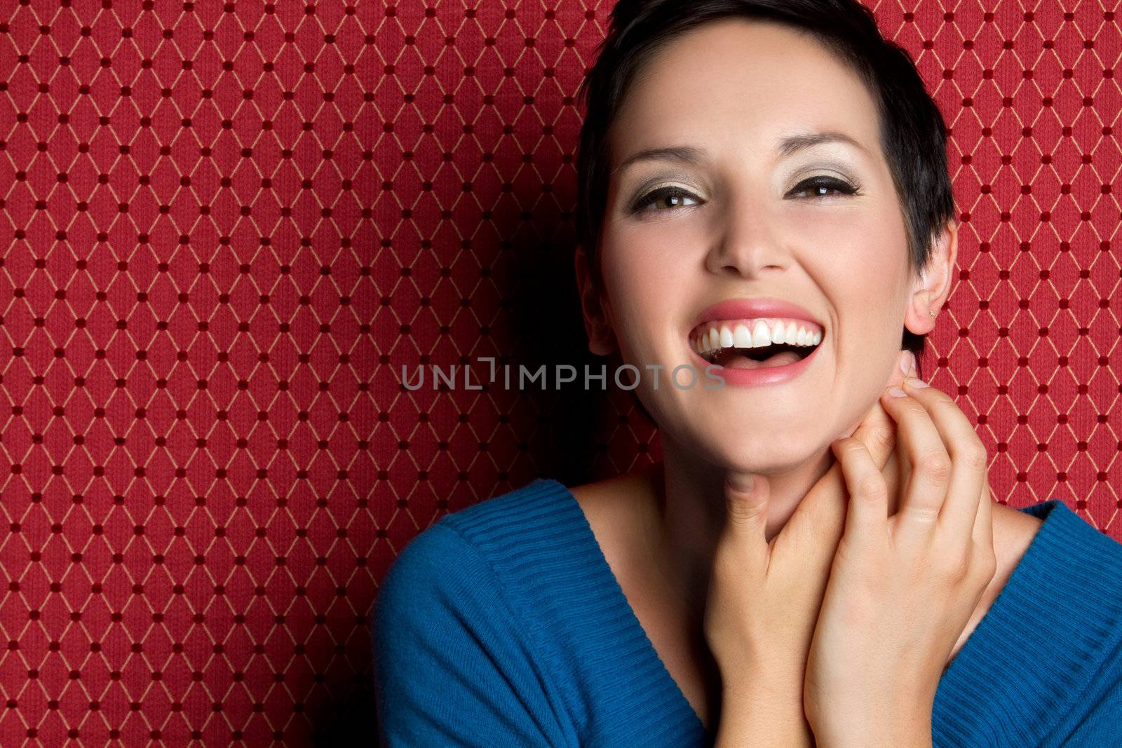 Beautiful smiling laughing young woman