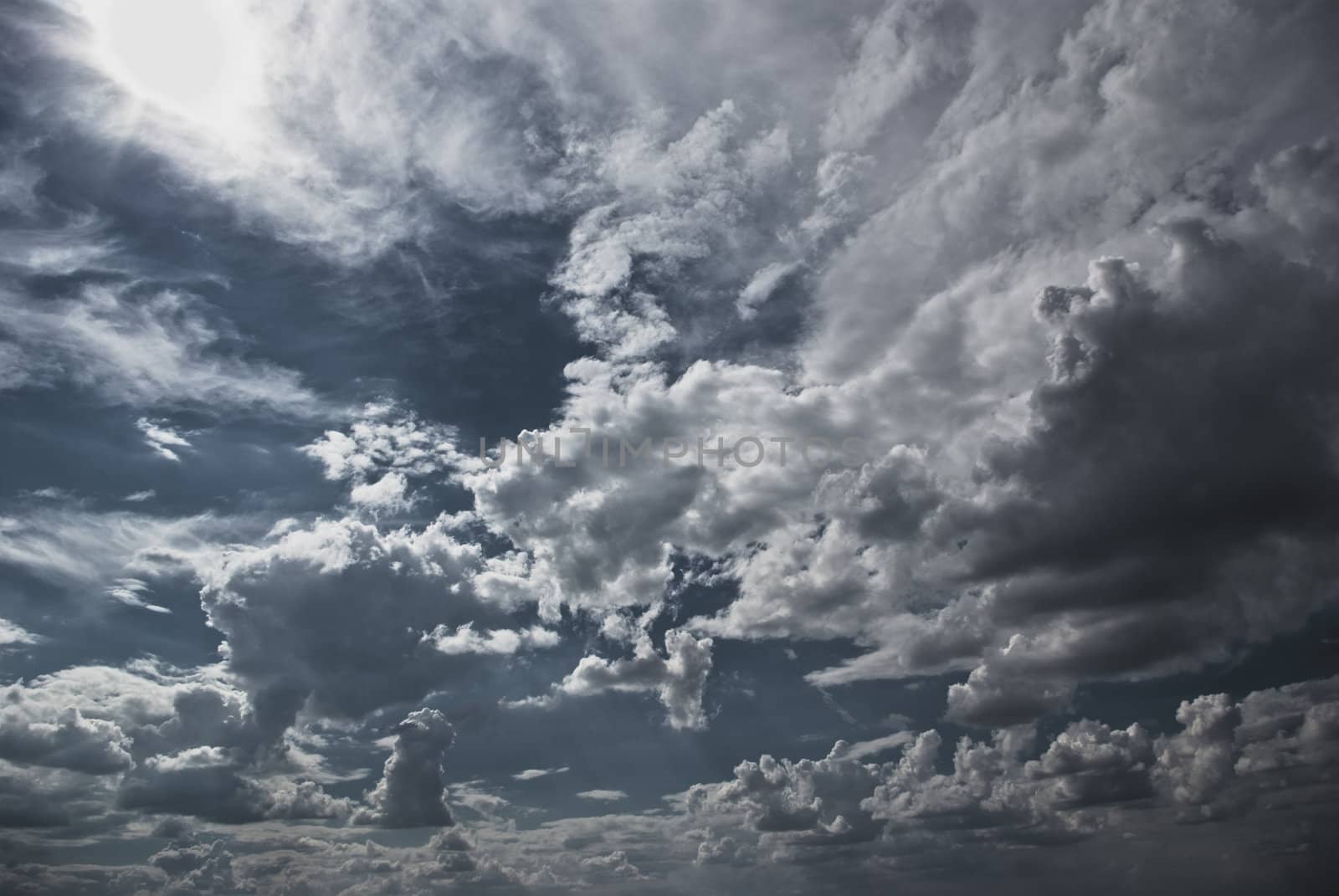 clouds in the sky drifting away in a light breeze