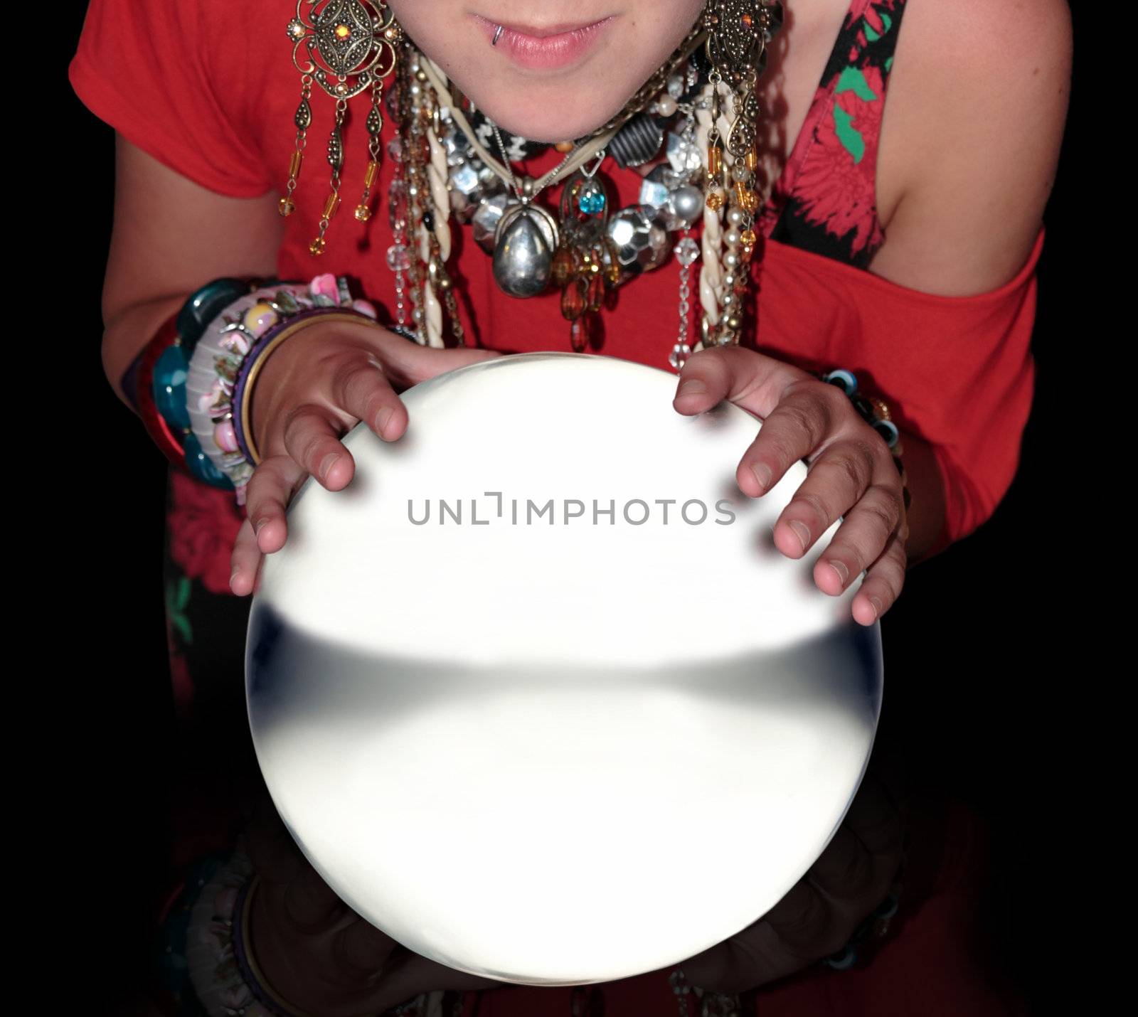 fortune teller over a blank crystal ball by morrbyte