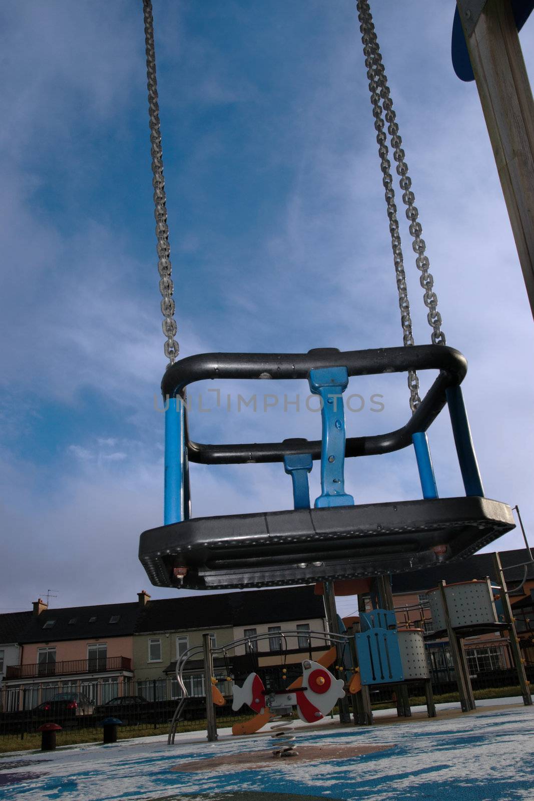 playground swing at the seaside resort of ballybunion ireland in winter