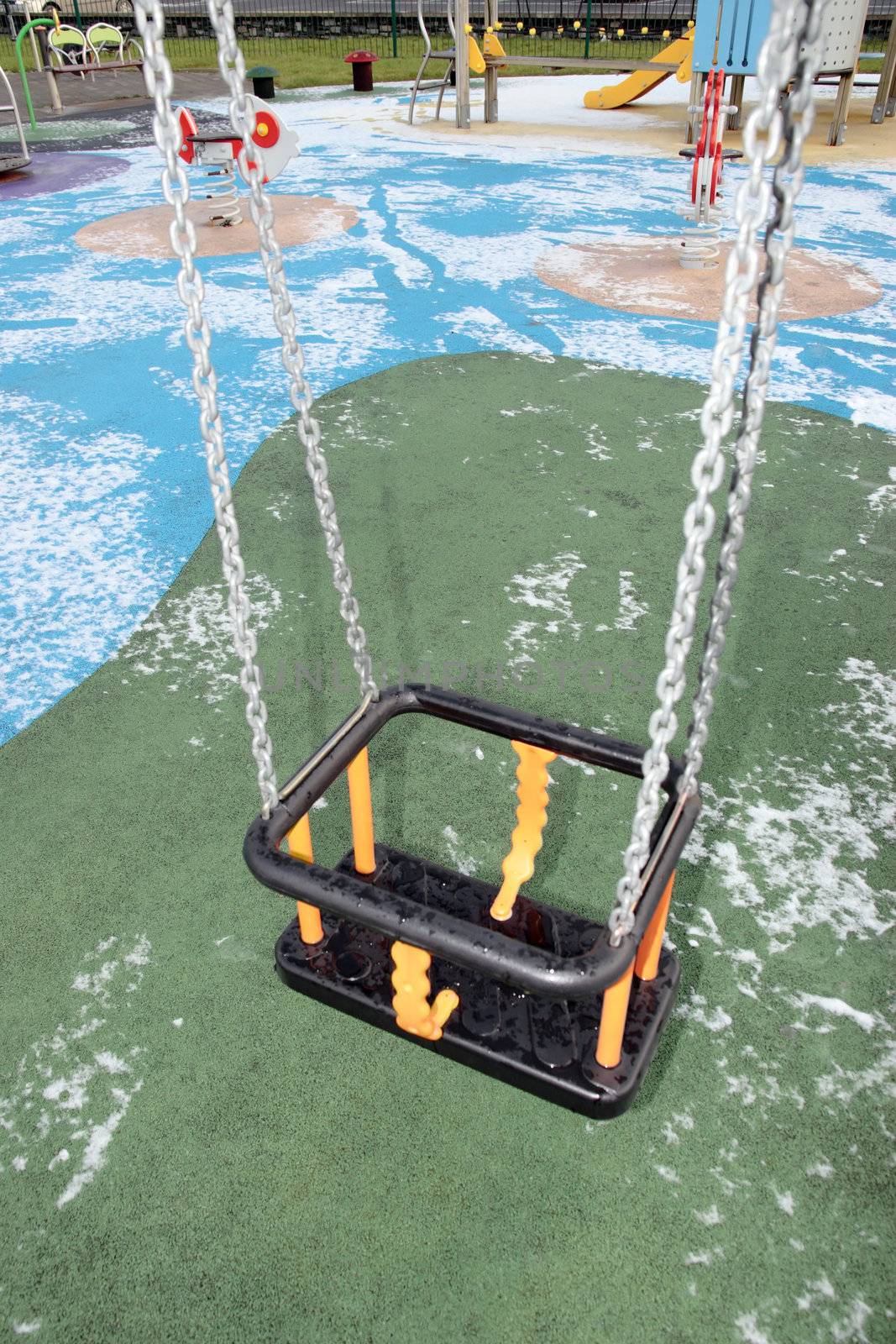 playground swing at the seaside resort of ballybunion ireland in winter