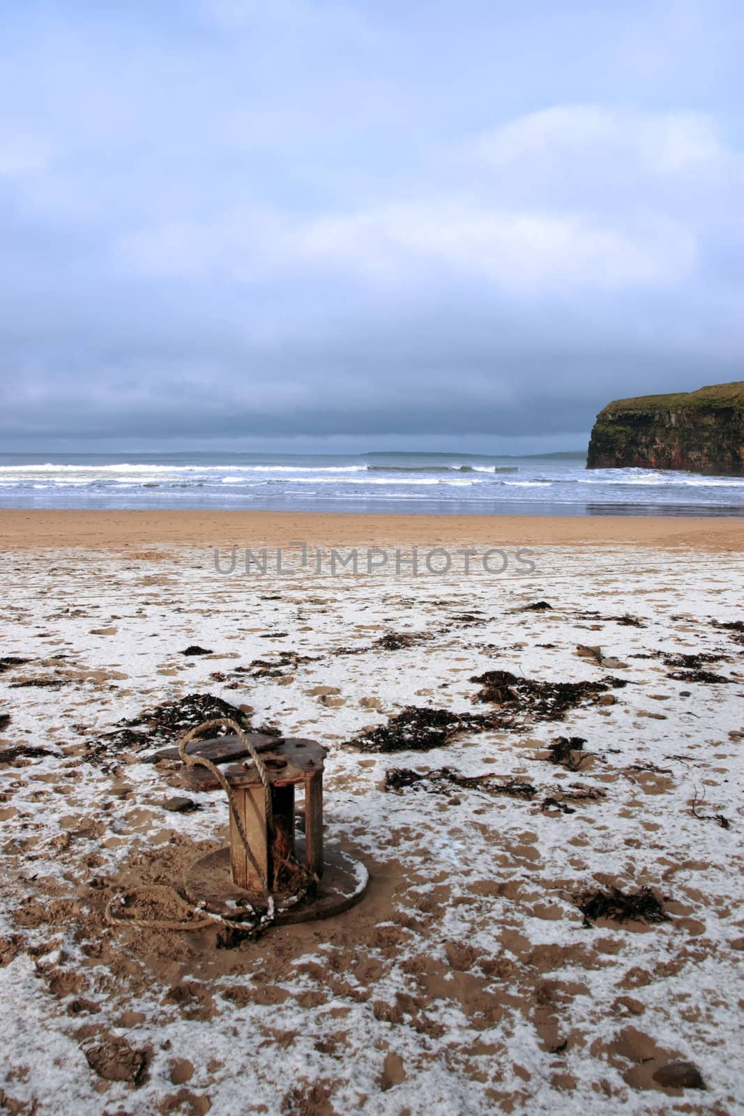 snow covered ballybunion beach in winter