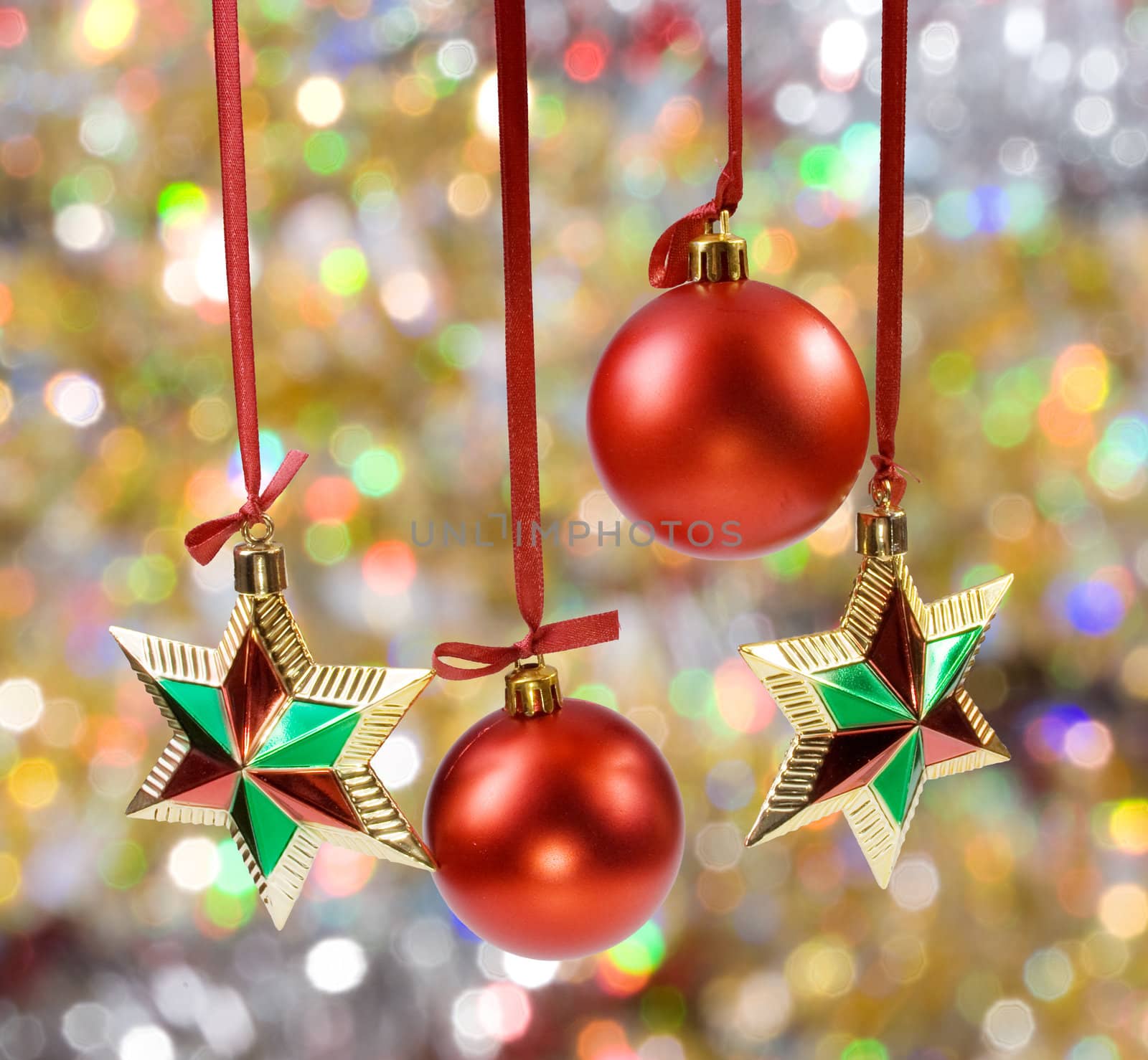 Christmas spheres and stars on the color background