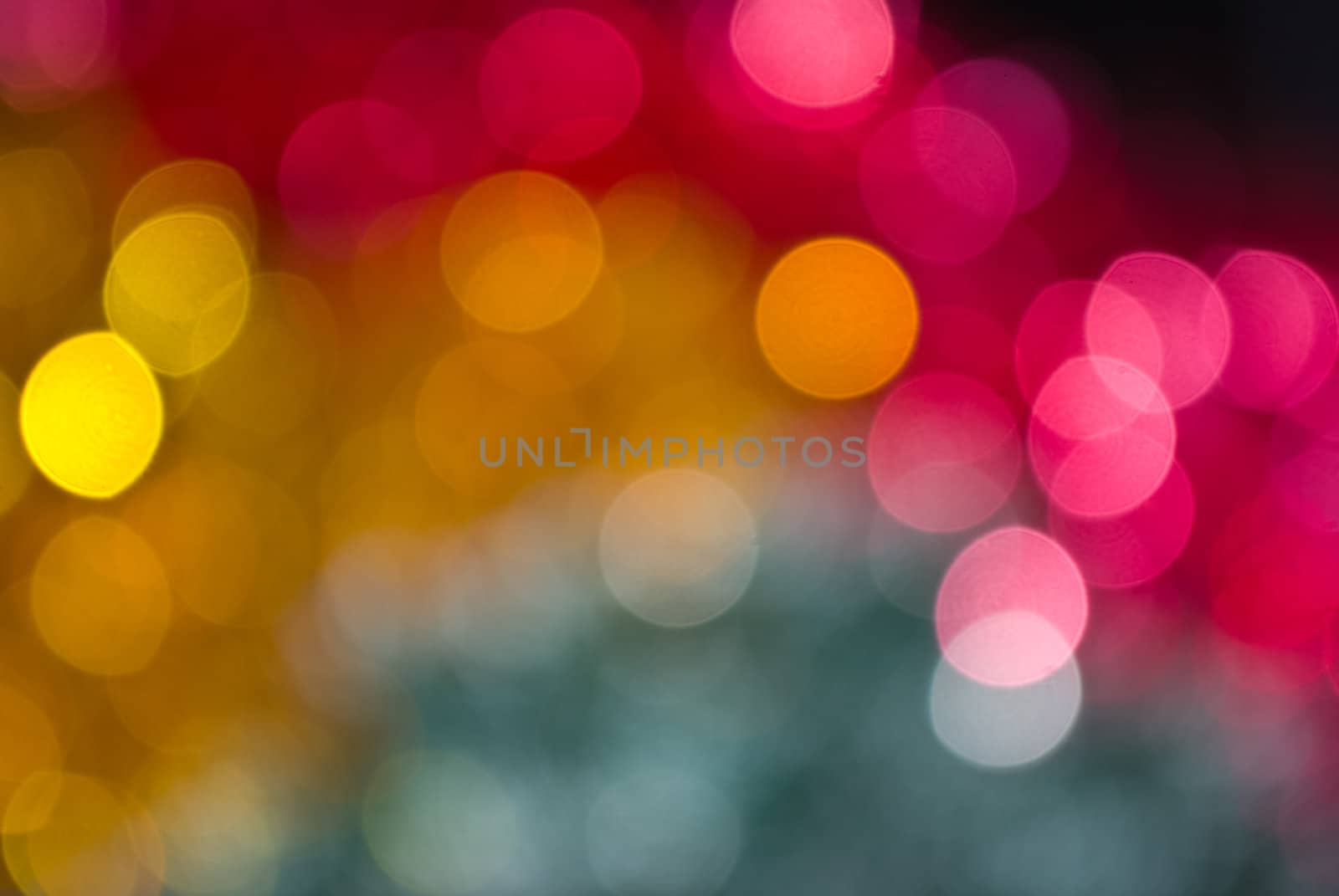 The colored abstract christmas lights as background