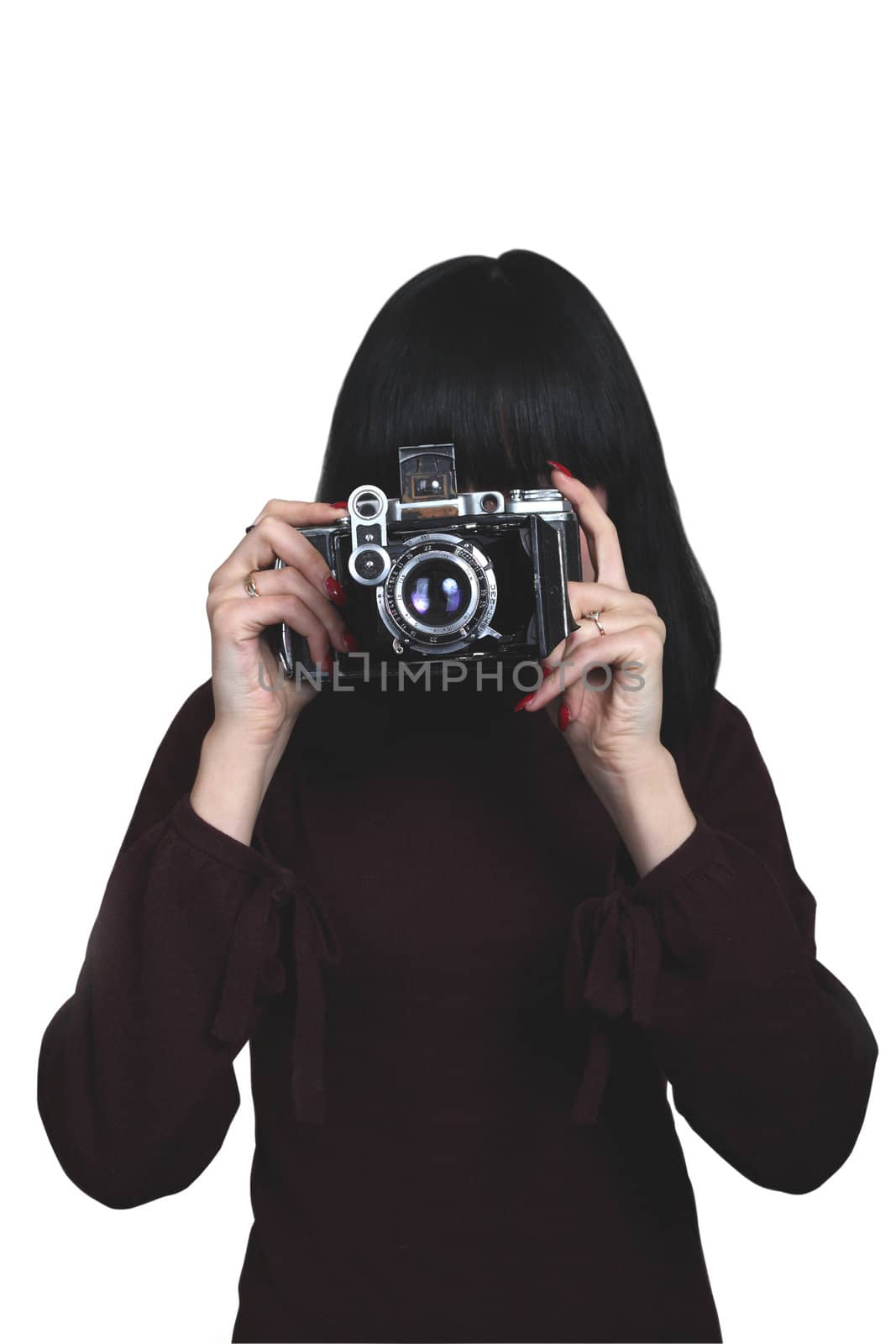 young girl with old film camera