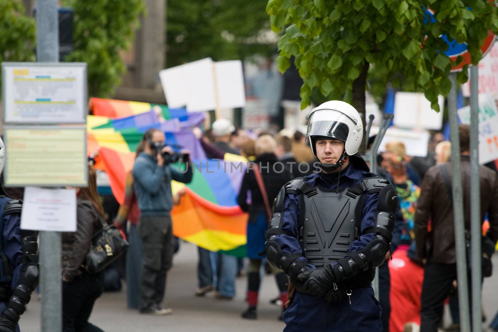 RIGA, LATVIA, MAY 16, 2009: Riot Police stands to separate Protestors against participants of Baltic Gay Pride 2009
