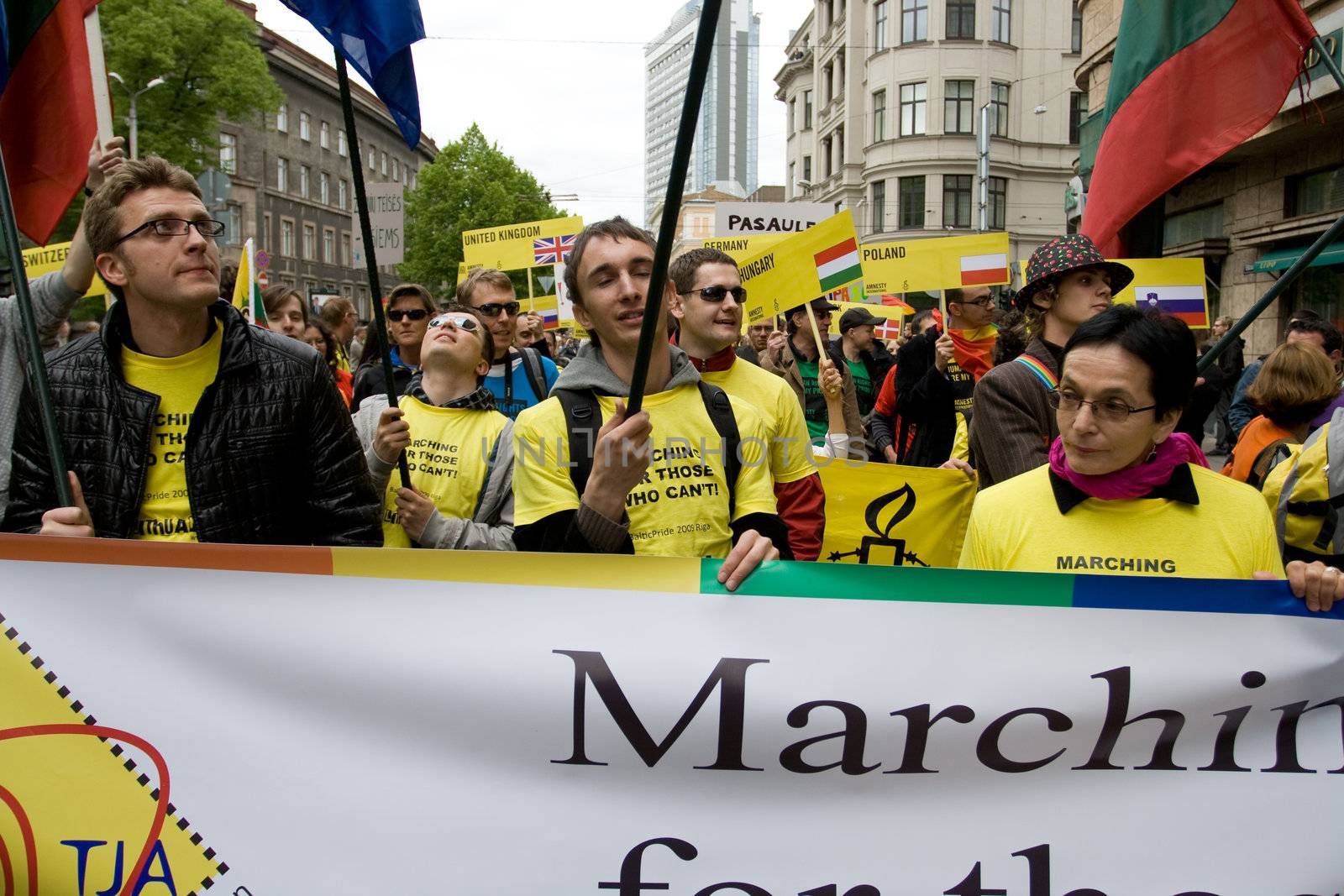 RIGA, LATVIA, MAY 16, 2009: Gay men and women and their supporters at parade in the Latvian capital, accompanied by a strong police presence and loud protest from anti-gay activists.