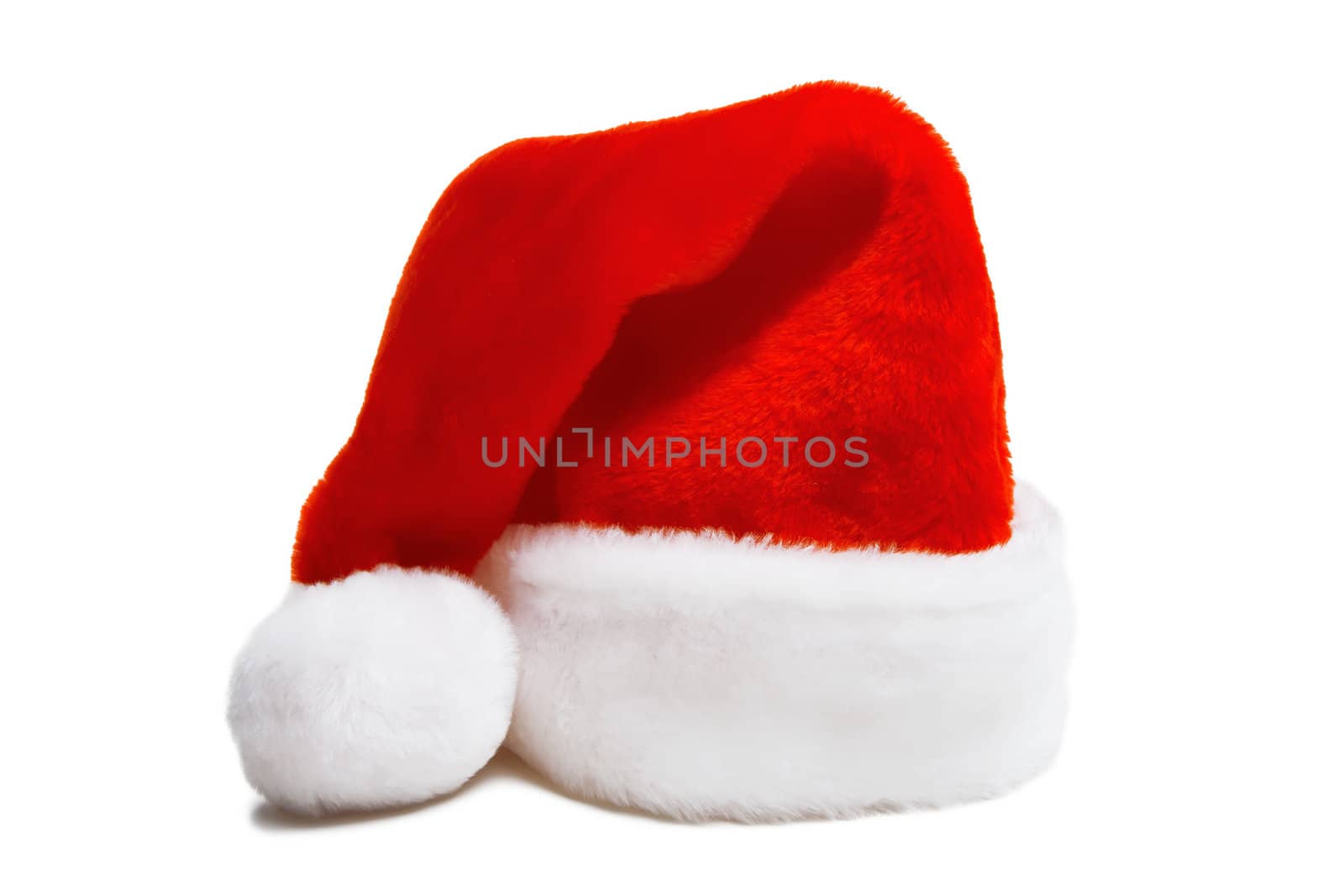 red furry Christmas hat of Santa Claus. Isolated white background
