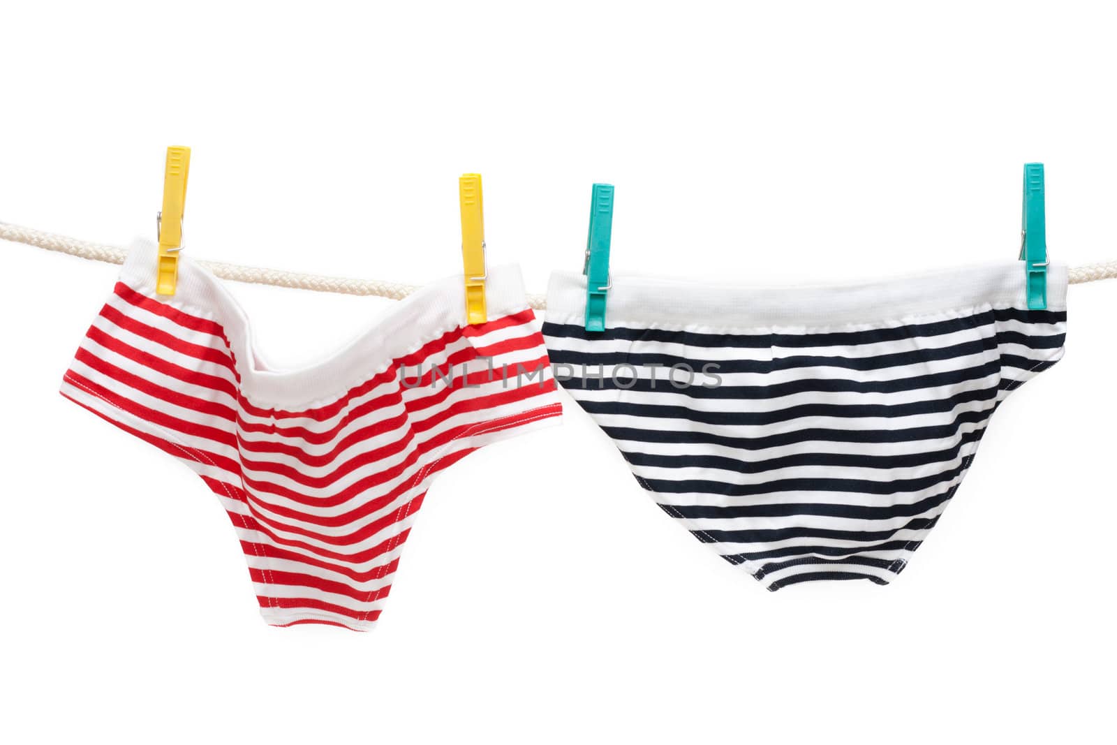 Colour undershorts hung on linen rope with clothes-peg