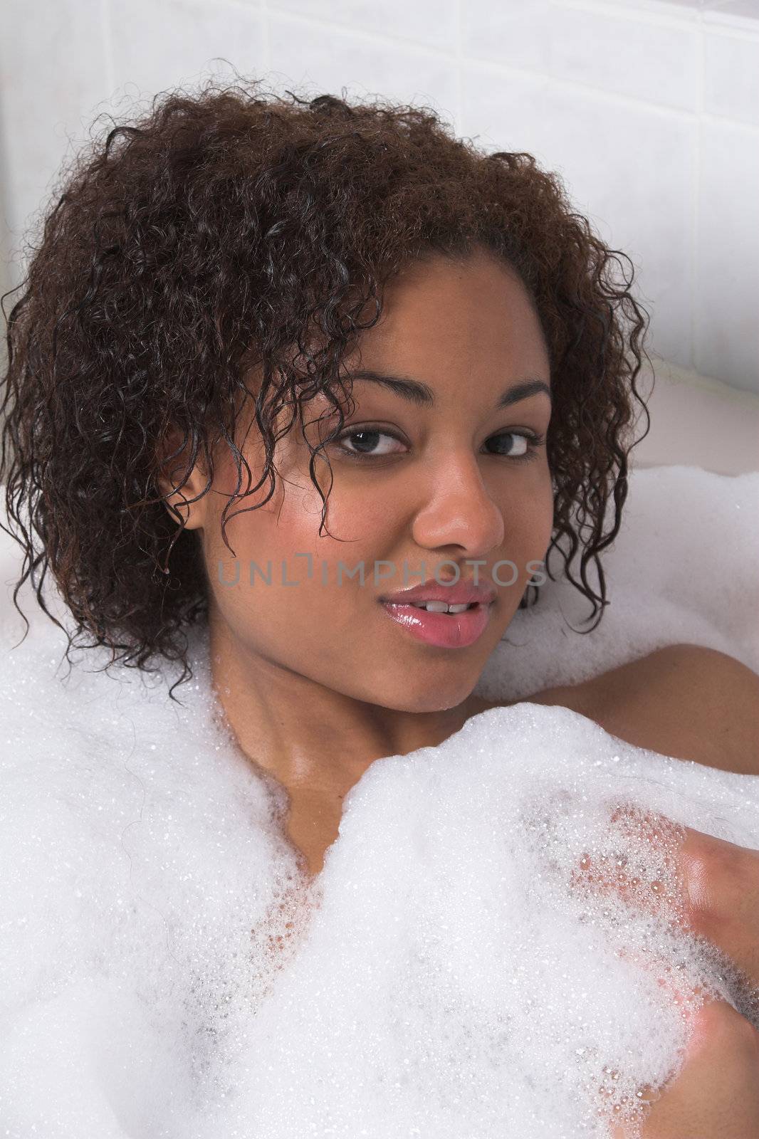 Beautiful woman having a bubblebath