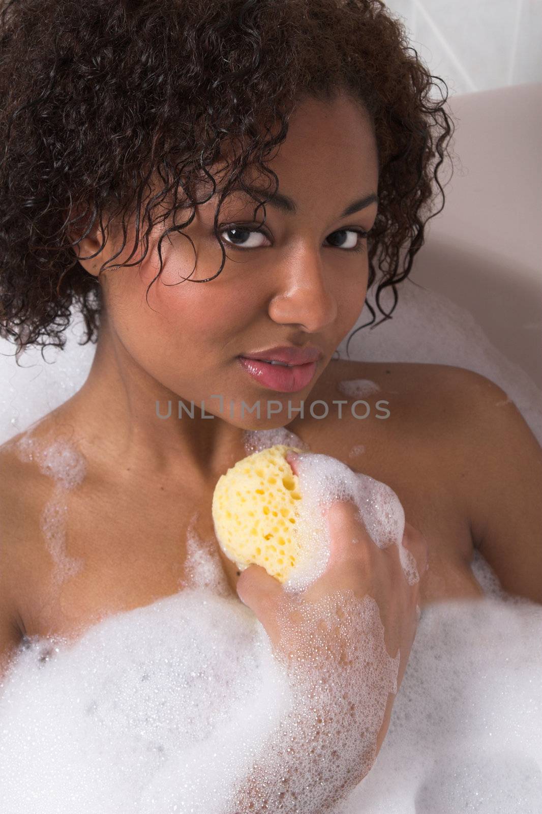 Beautiful woman enjoying her bath