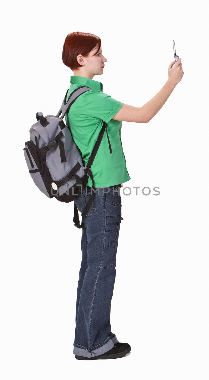 Teenager taking photos using a mobile phone camera-profile.