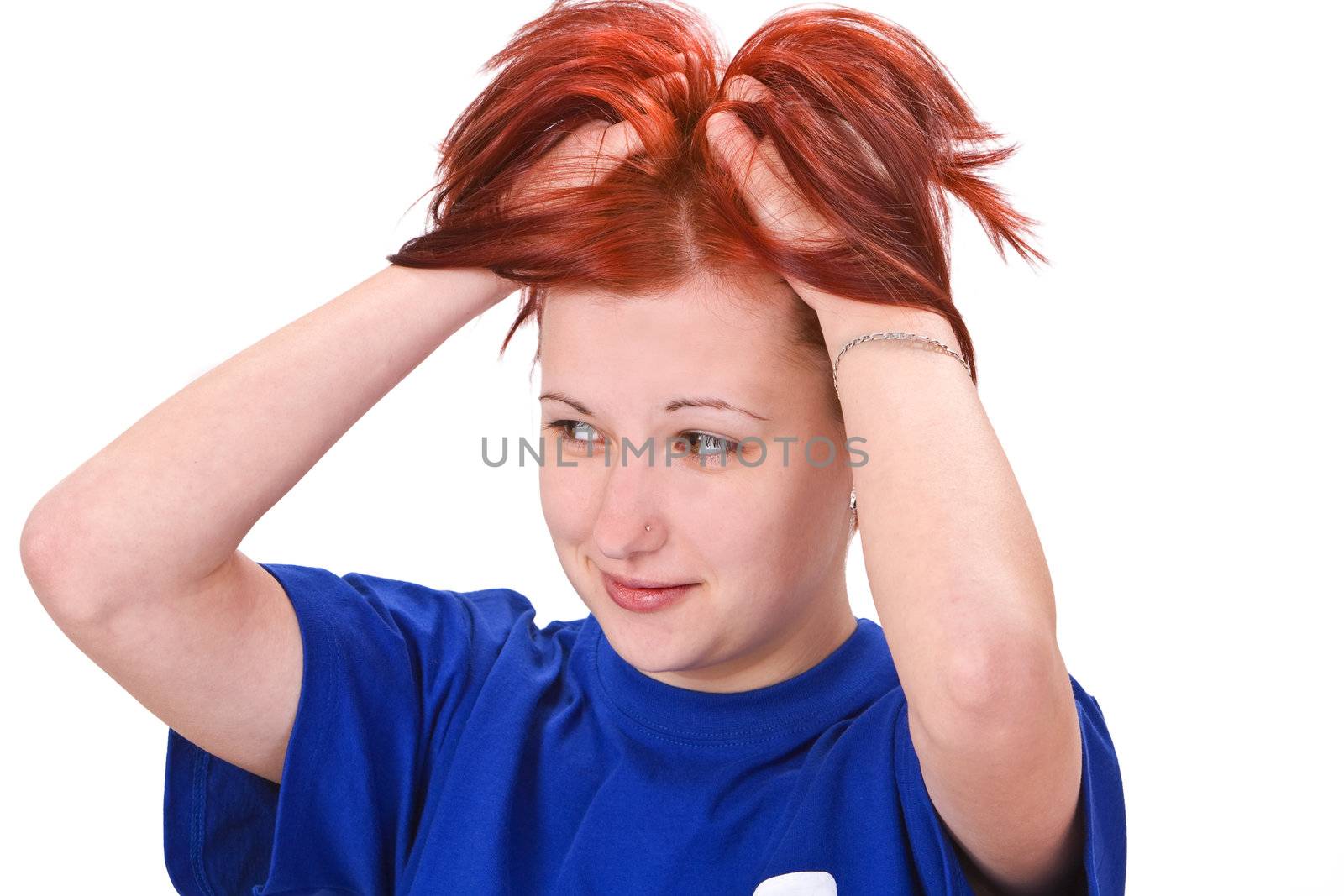 Image of a redeheaded girl expressing a reaction to an unexpected mistake.Shot with Canon 70-200mm f/2.8L IS USM