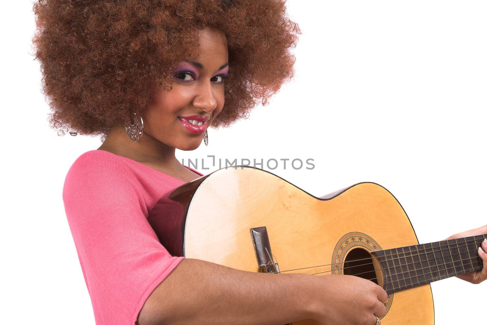 Beautiful black woman playing the guitar
