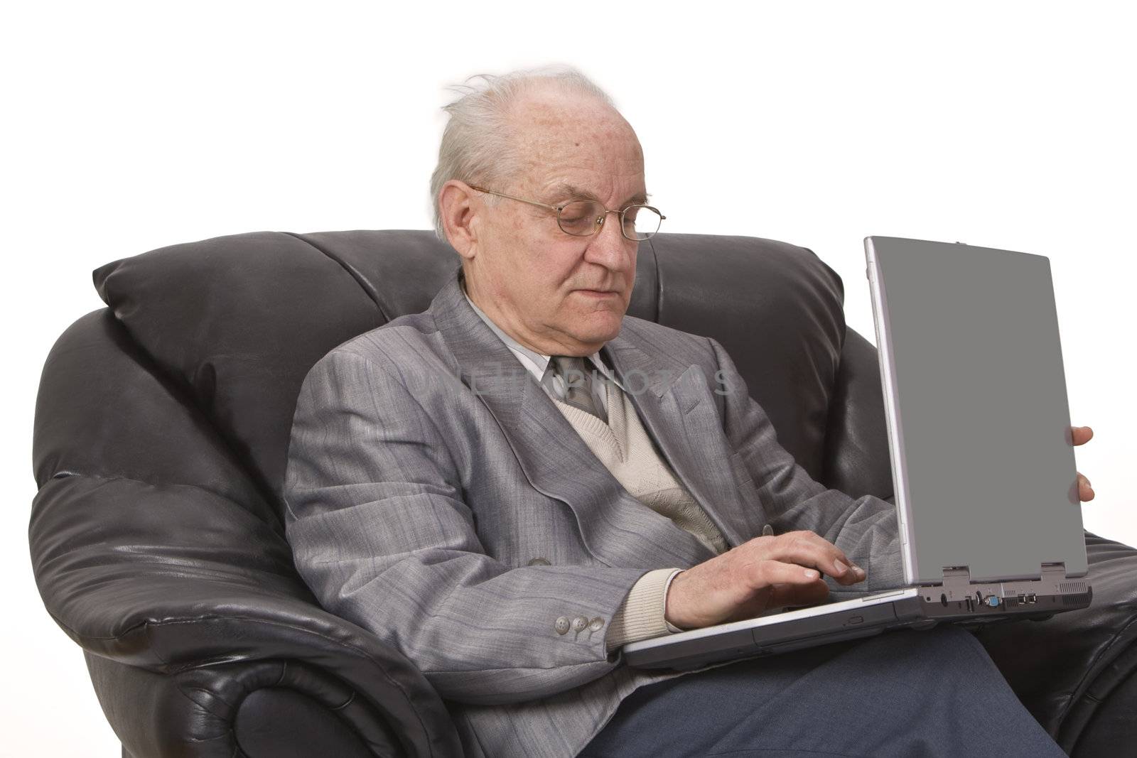 Close-up image of a senior man using a laptop.Shot with Canon 70-200mm f/2.8L IS USM