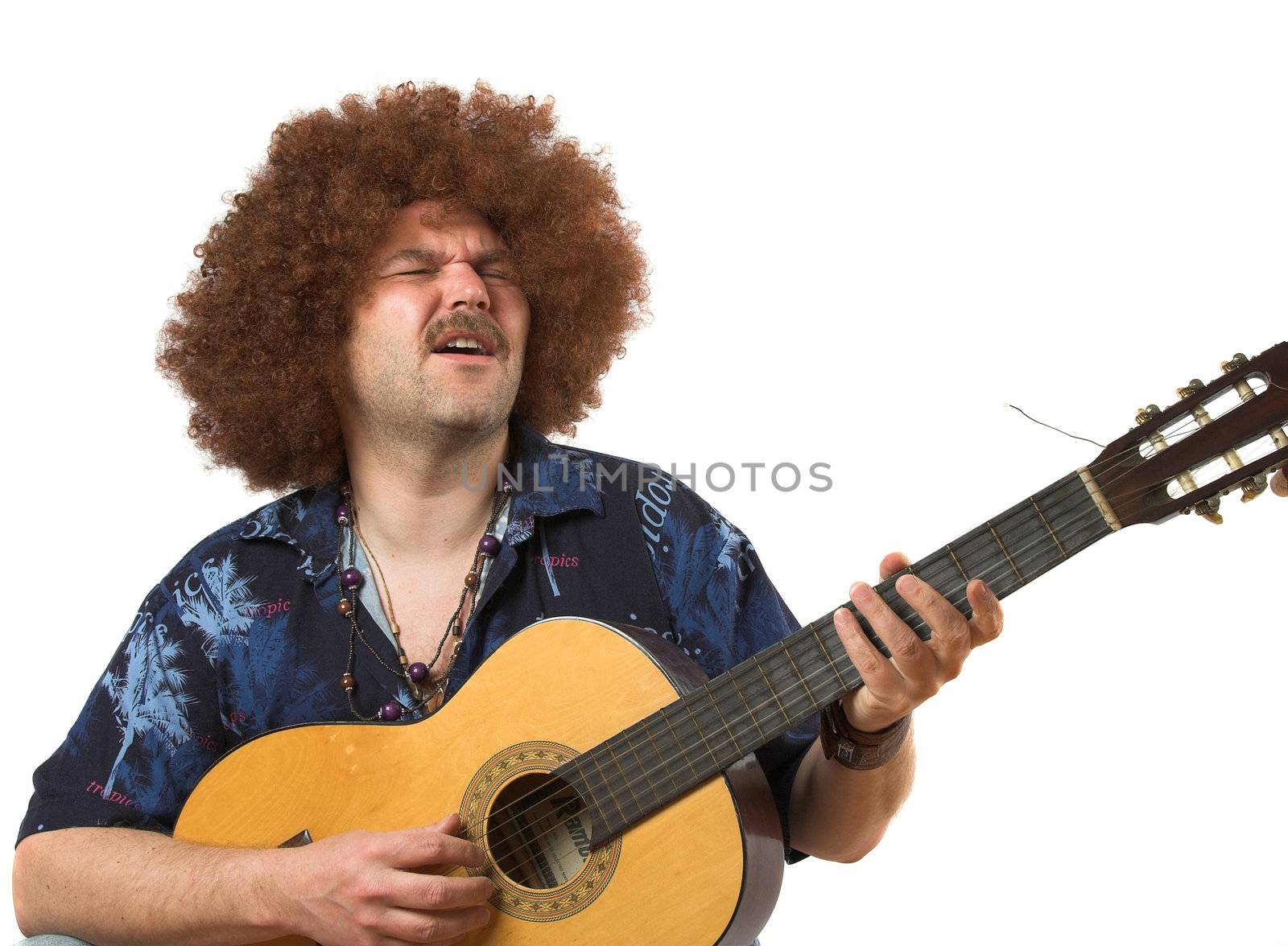 Hippie playing his guitar