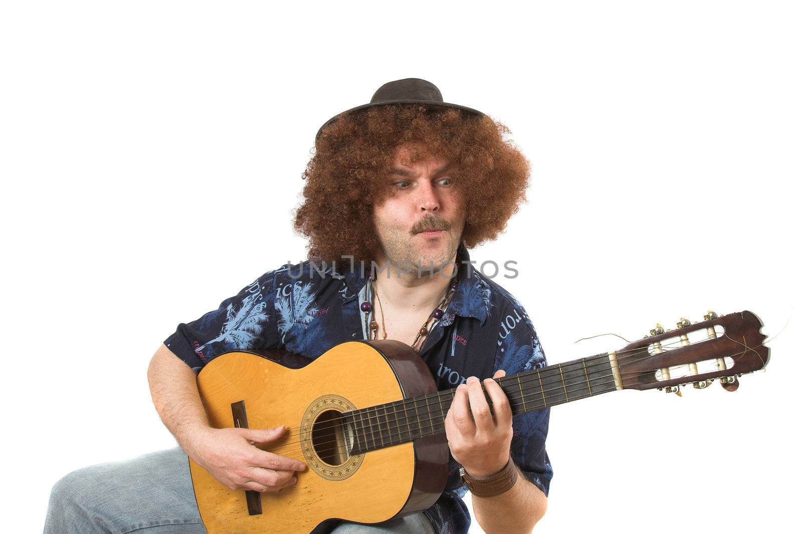Man with afro hair and guitar