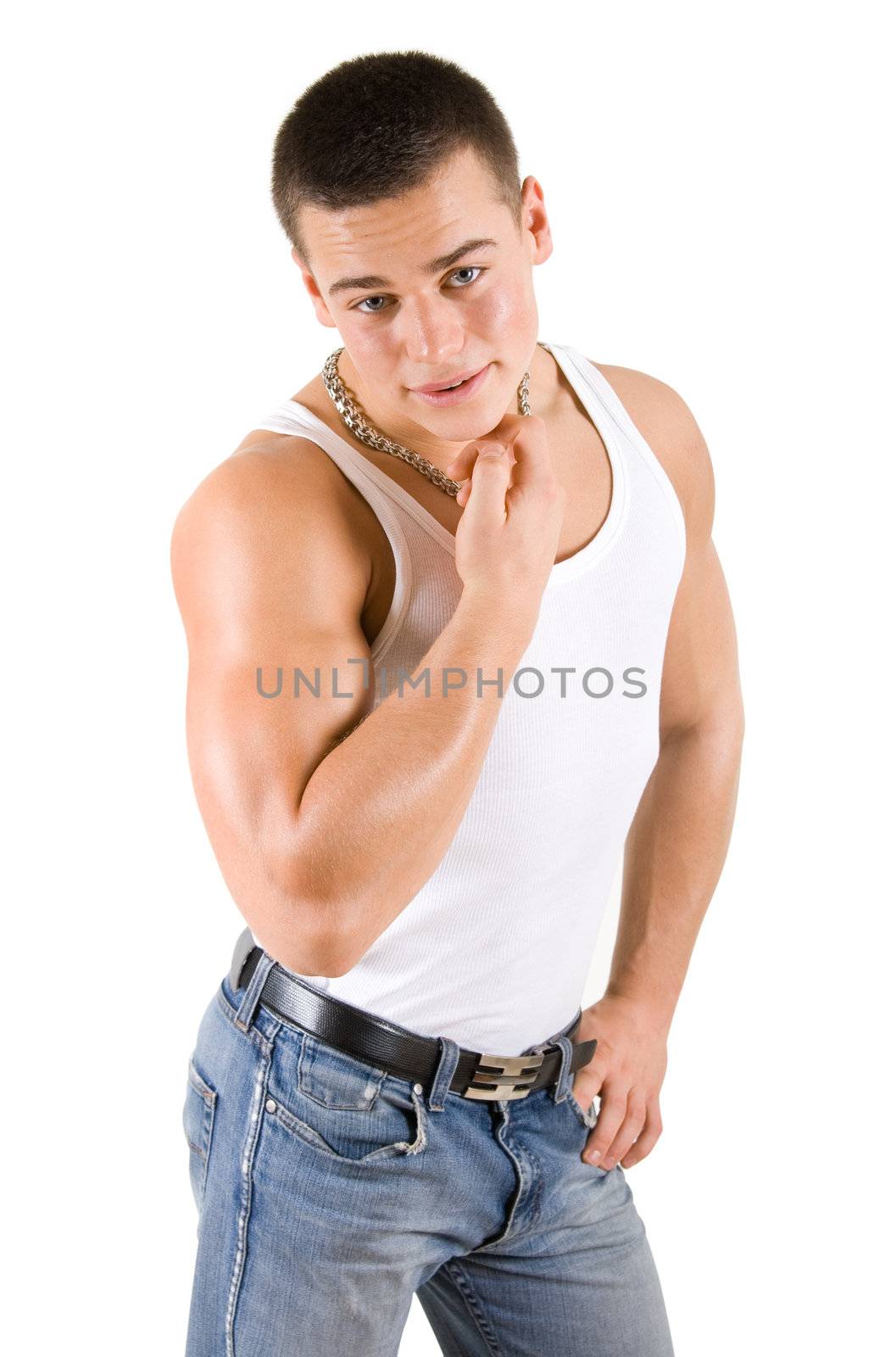 Young athlete in white shirt and blue jeans