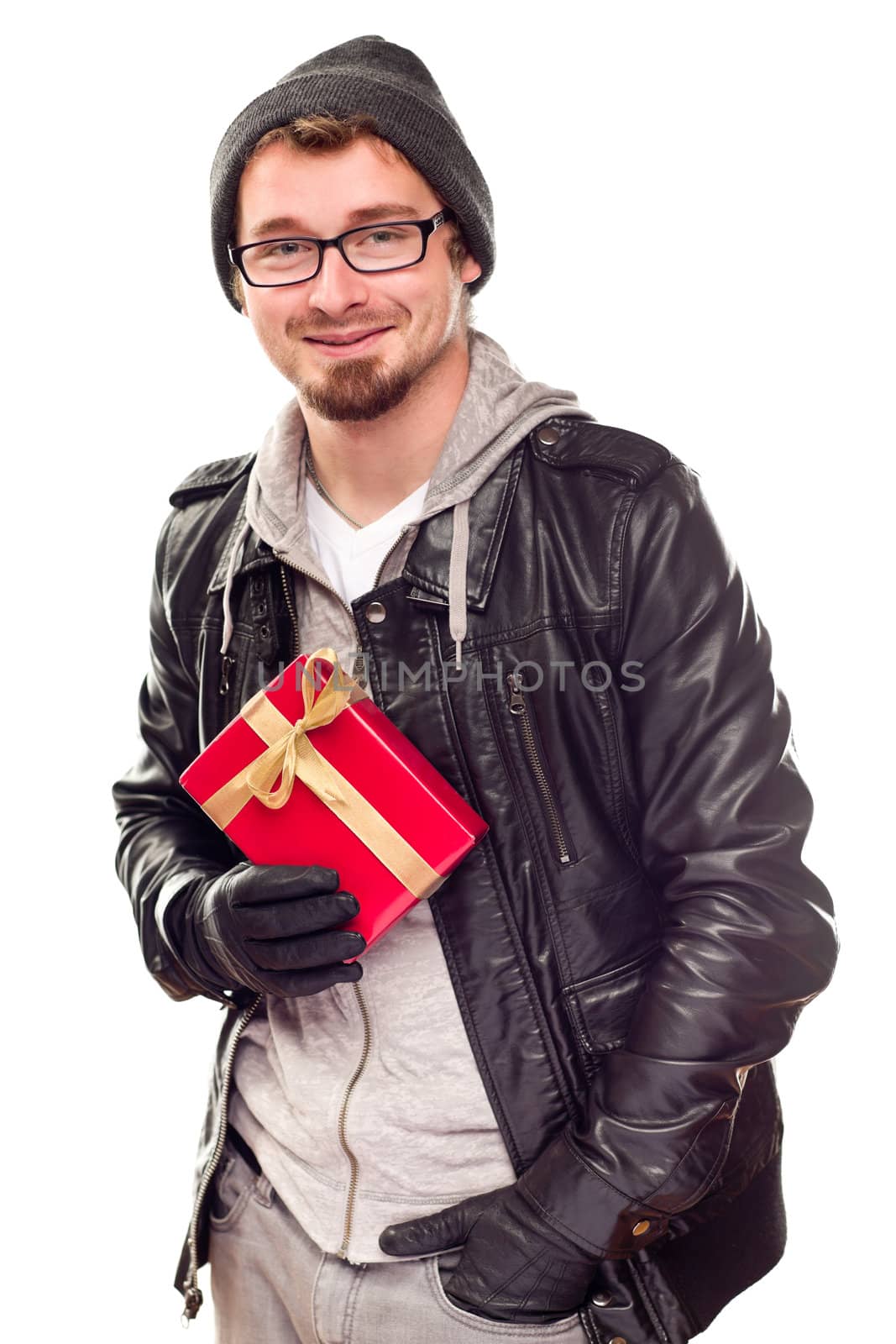 Warmly Dressed Handsome Young Man Holding Wrapped Gift Isolated on a White Background.