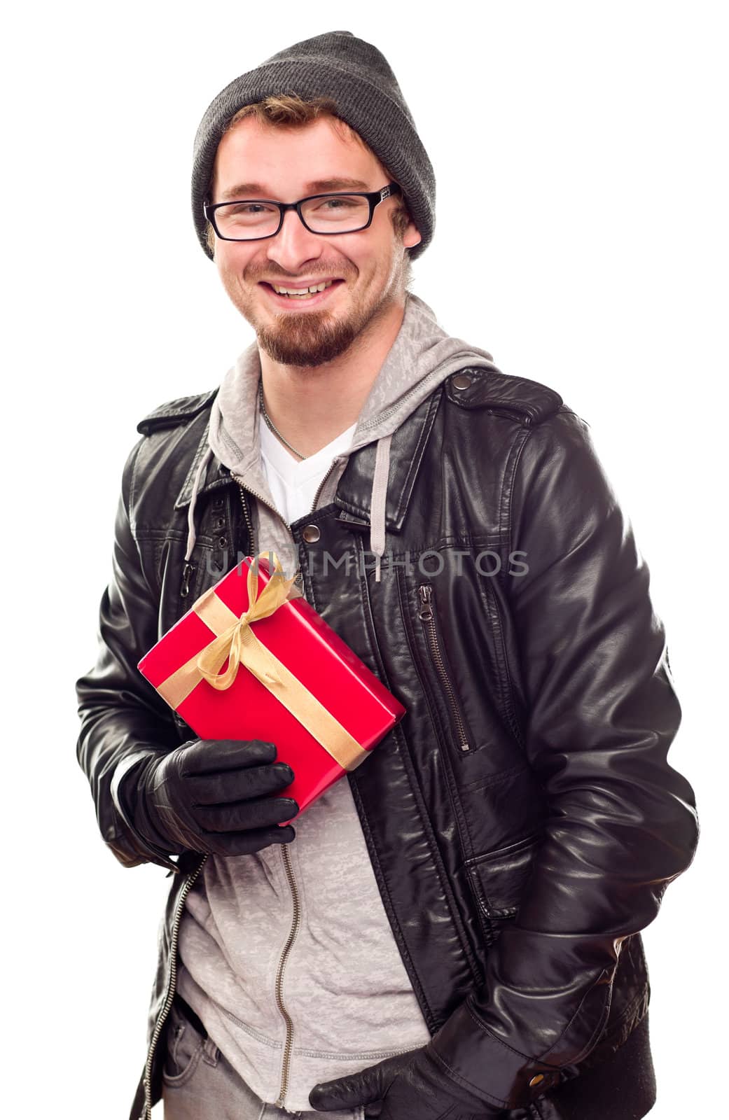 Warmly Dressed Handsome Young Man Holding Wrapped Gift Isolated on a White Background.