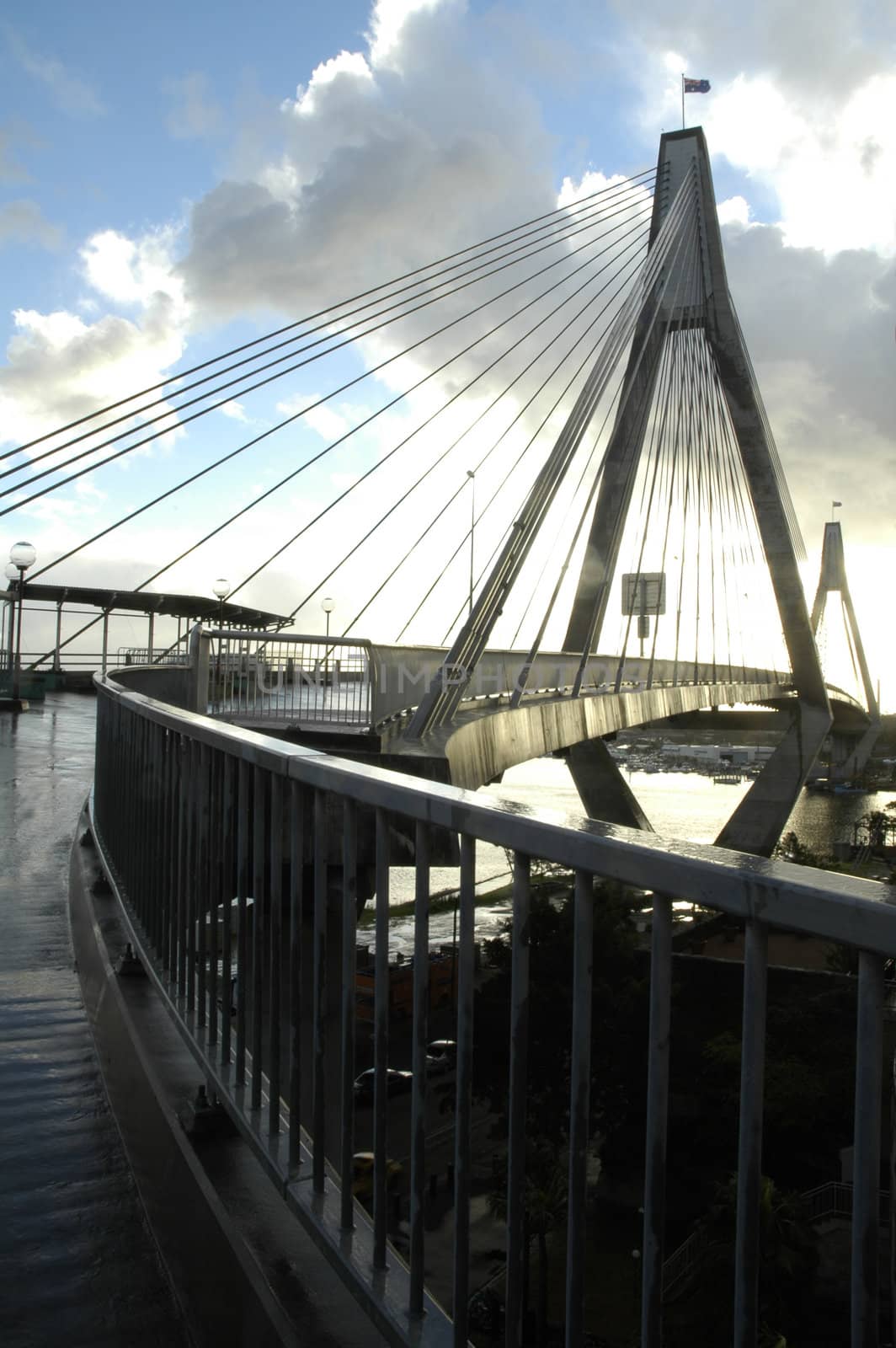 high contrast photo of Anzac Bridge in Sydney, photo taken after rain, against sun