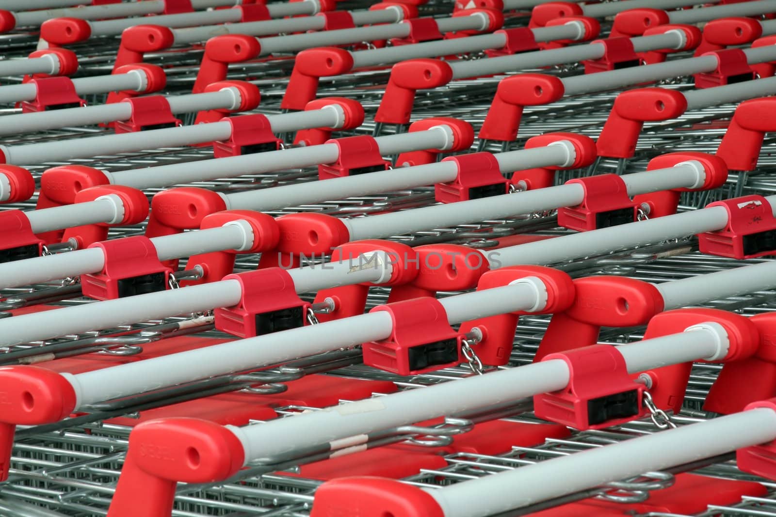 parked shopping trolleys, red and grey color