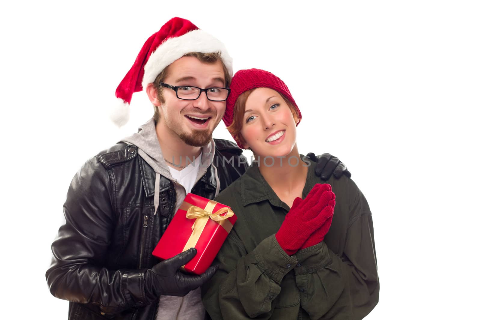 Warm Attractive Young Couple with Holiday Gift Isolated on a White Background.