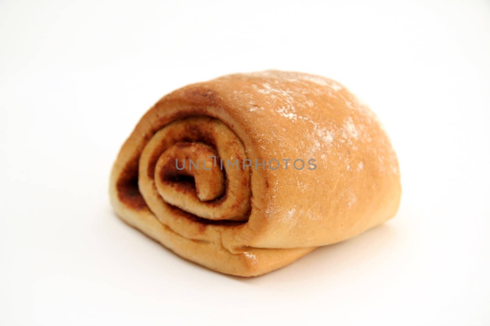 sweet cinnamon roll isolated on white background