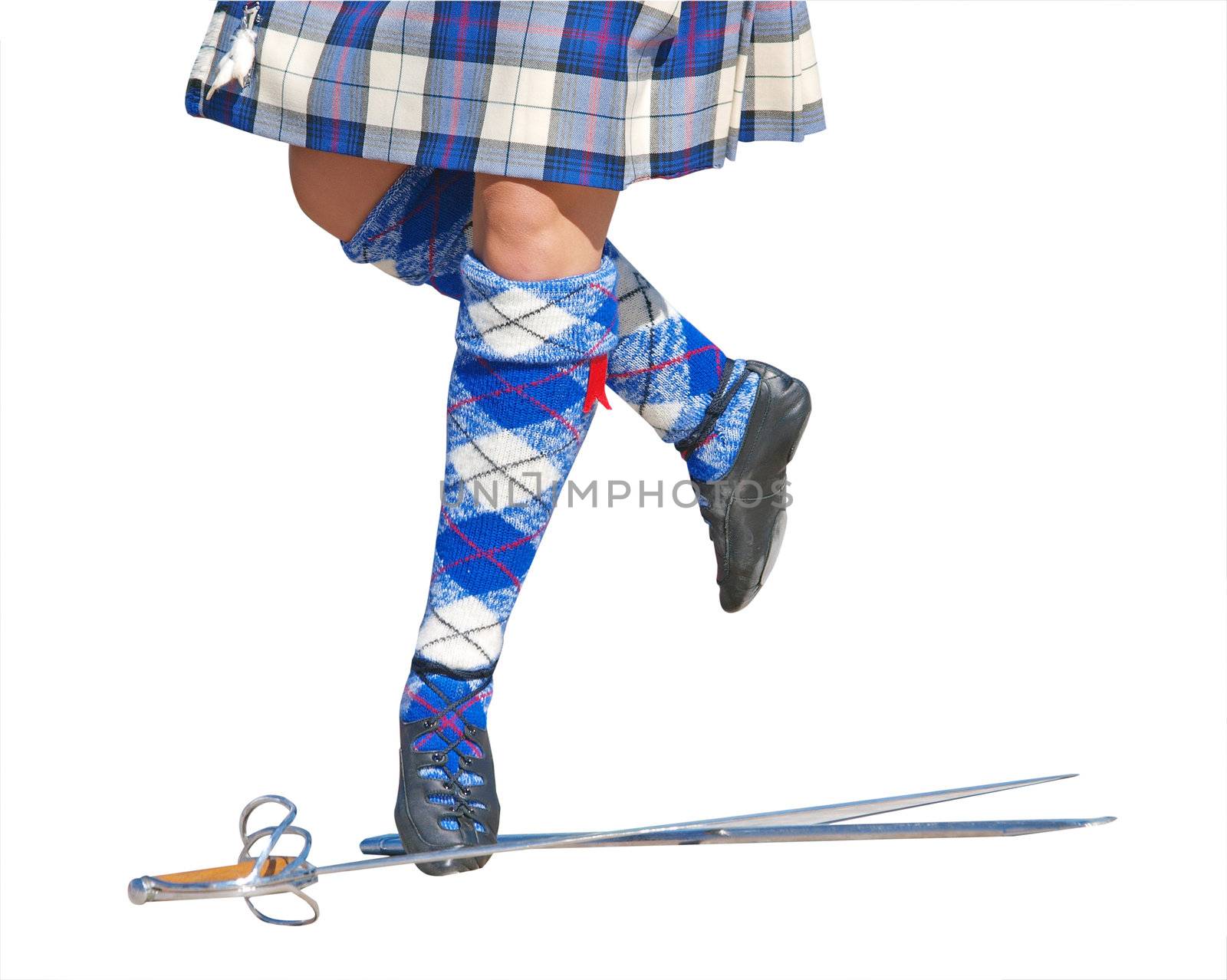 The feet of a highland Sword Dancer isolated with clipping path   
        