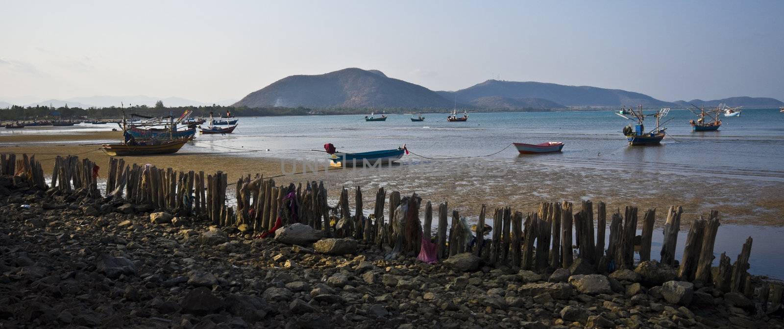 old fishermen vessels in the bay of Ao Noi