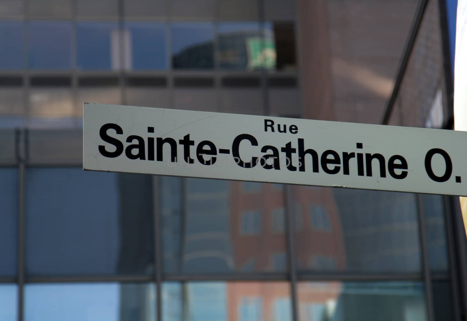 A street sign for Sainte-Catherine street in Montreal, Quebec, Canada.