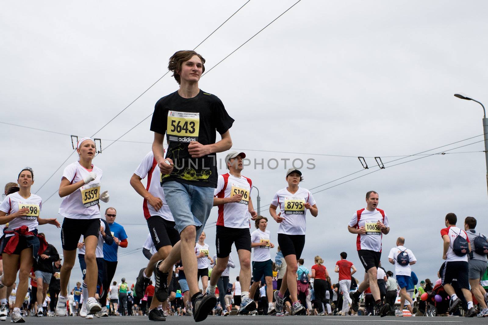 RIGA, LATVIA, MAY 17, 2009: Marathon runners start the Riga International Marathon on May 17