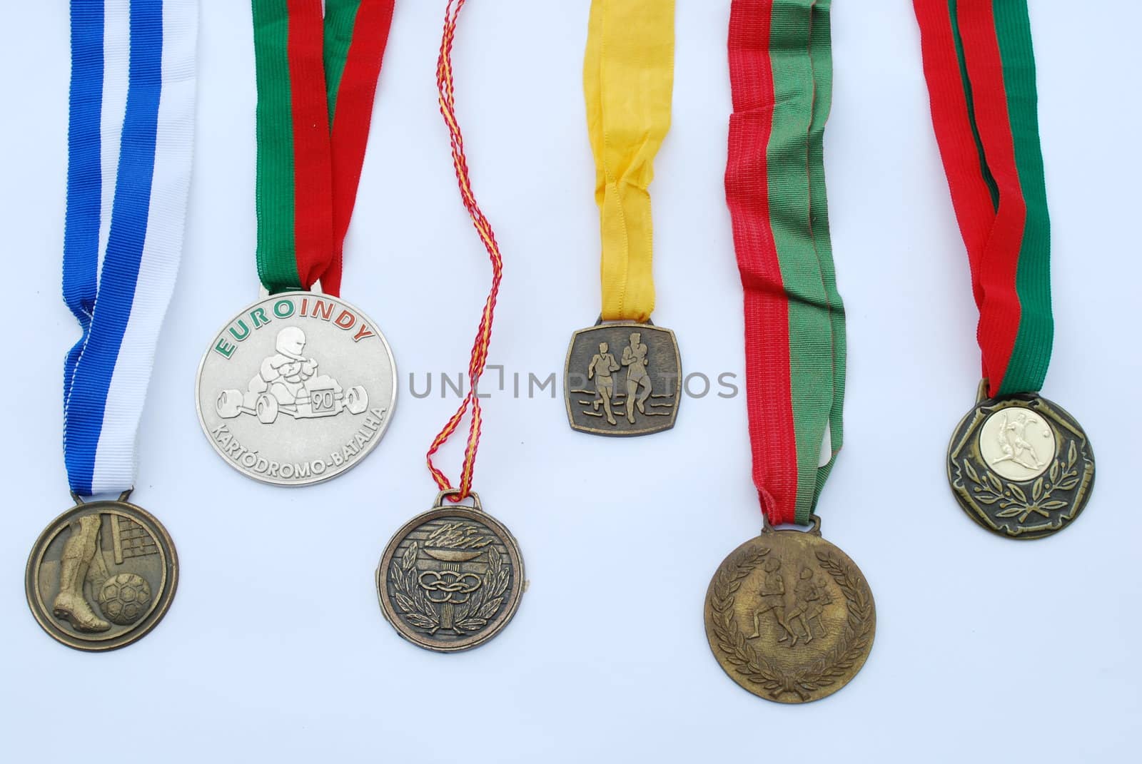 photo of a collection of medal awards from a sport competition