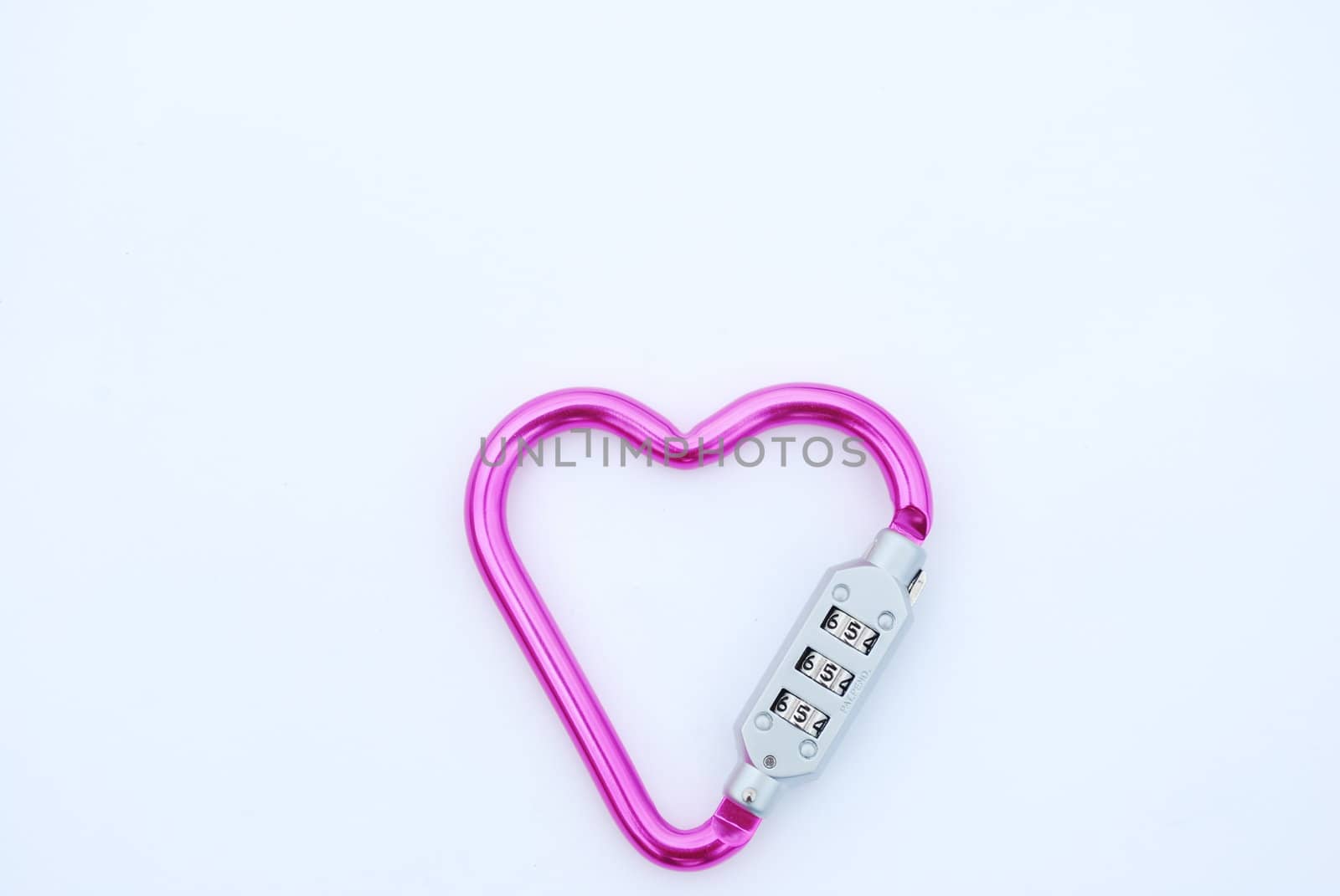 photo of a heart shaped violet carabiner with lockpad