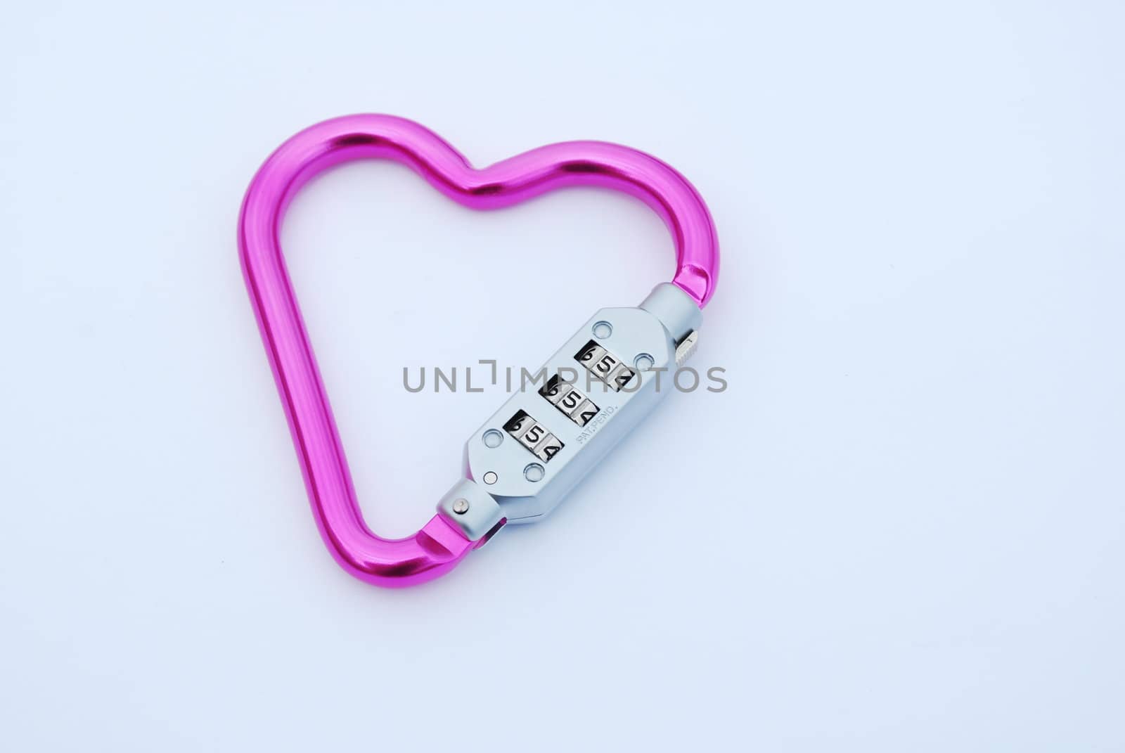 photo of a heart shaped violet carabiner with lockpad