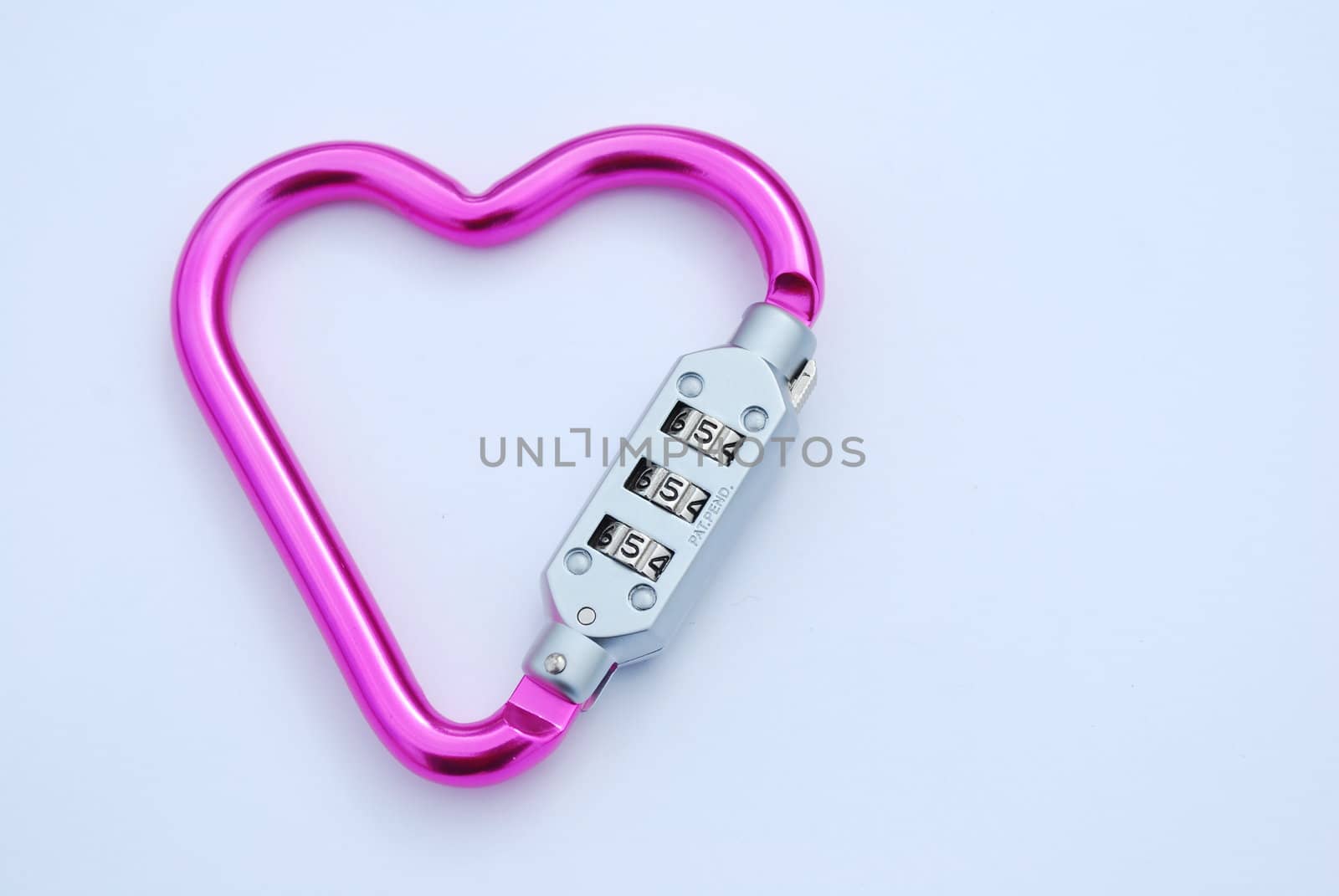 photo of a heart shaped violet carabiner with lockpad