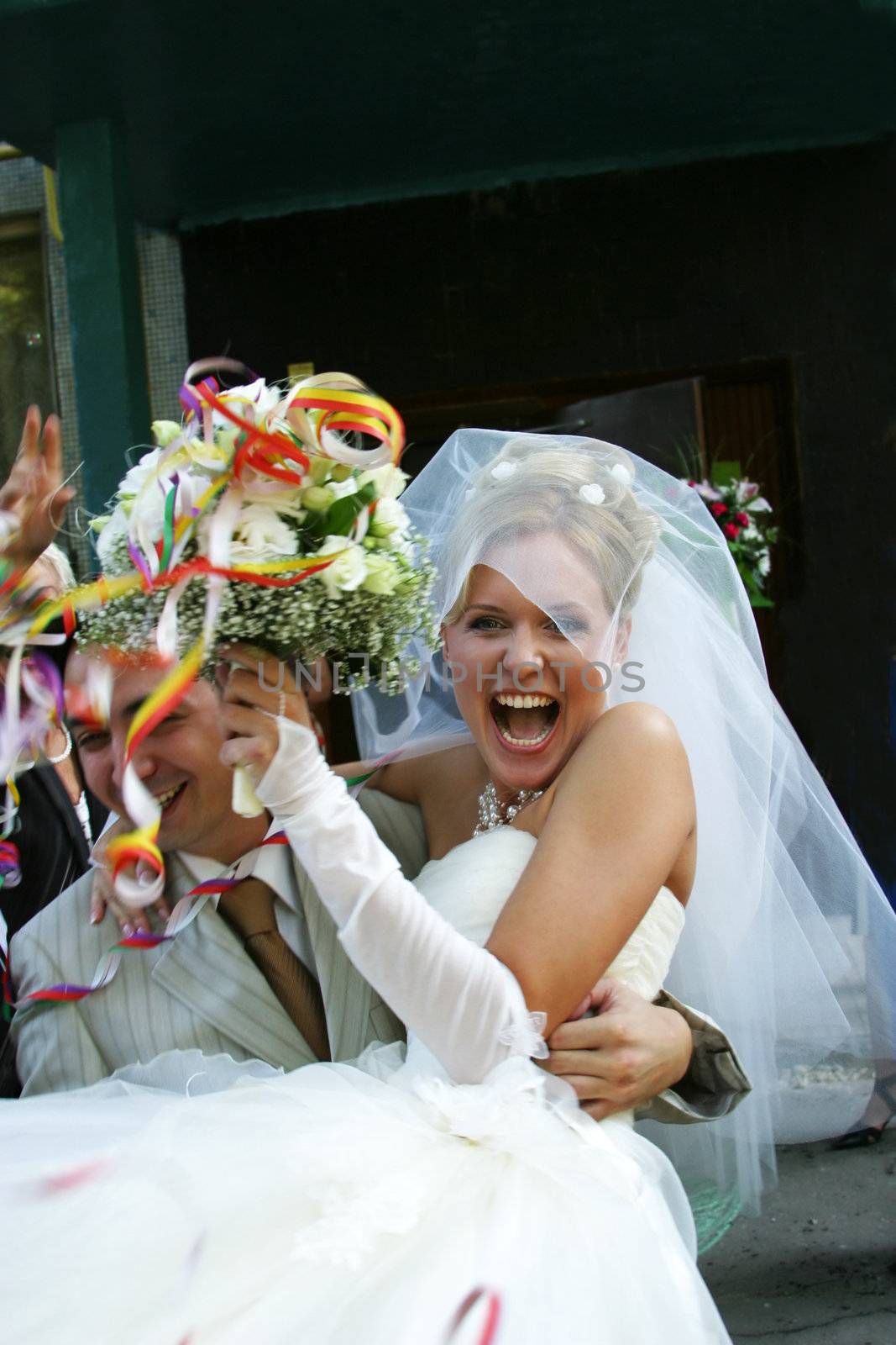 Happy groom and the bride in day of wedding