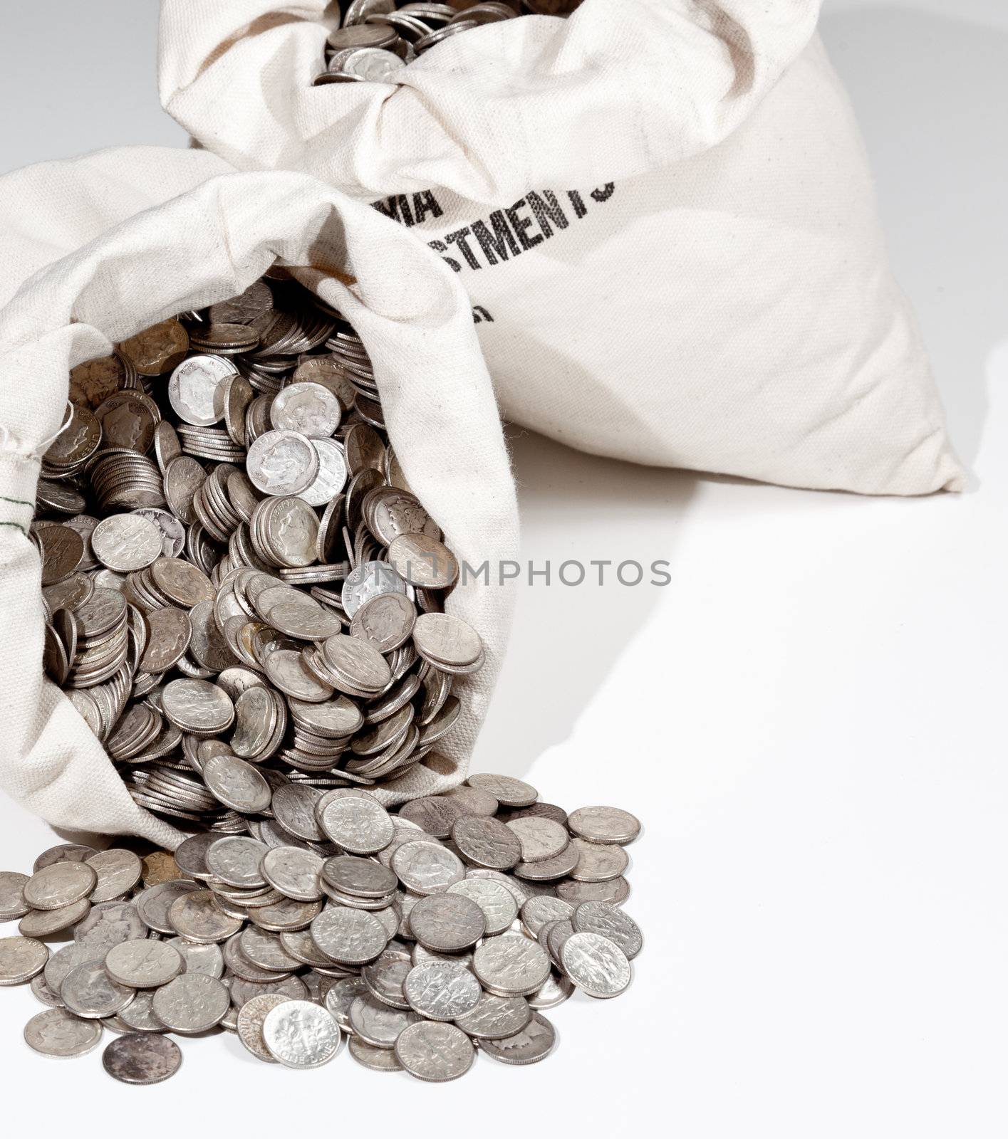 Linen bag of old pure silver coins used to invest in silver as a commodity