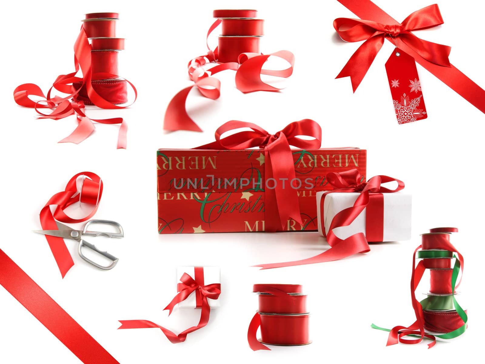 Different sizes of red ribbons and gift wrapped boxes isolated on white background