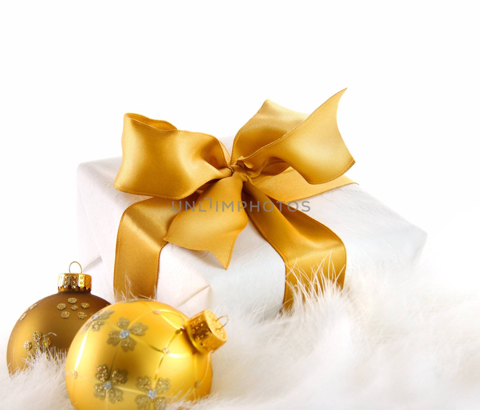 Gold ribbon gift on white background