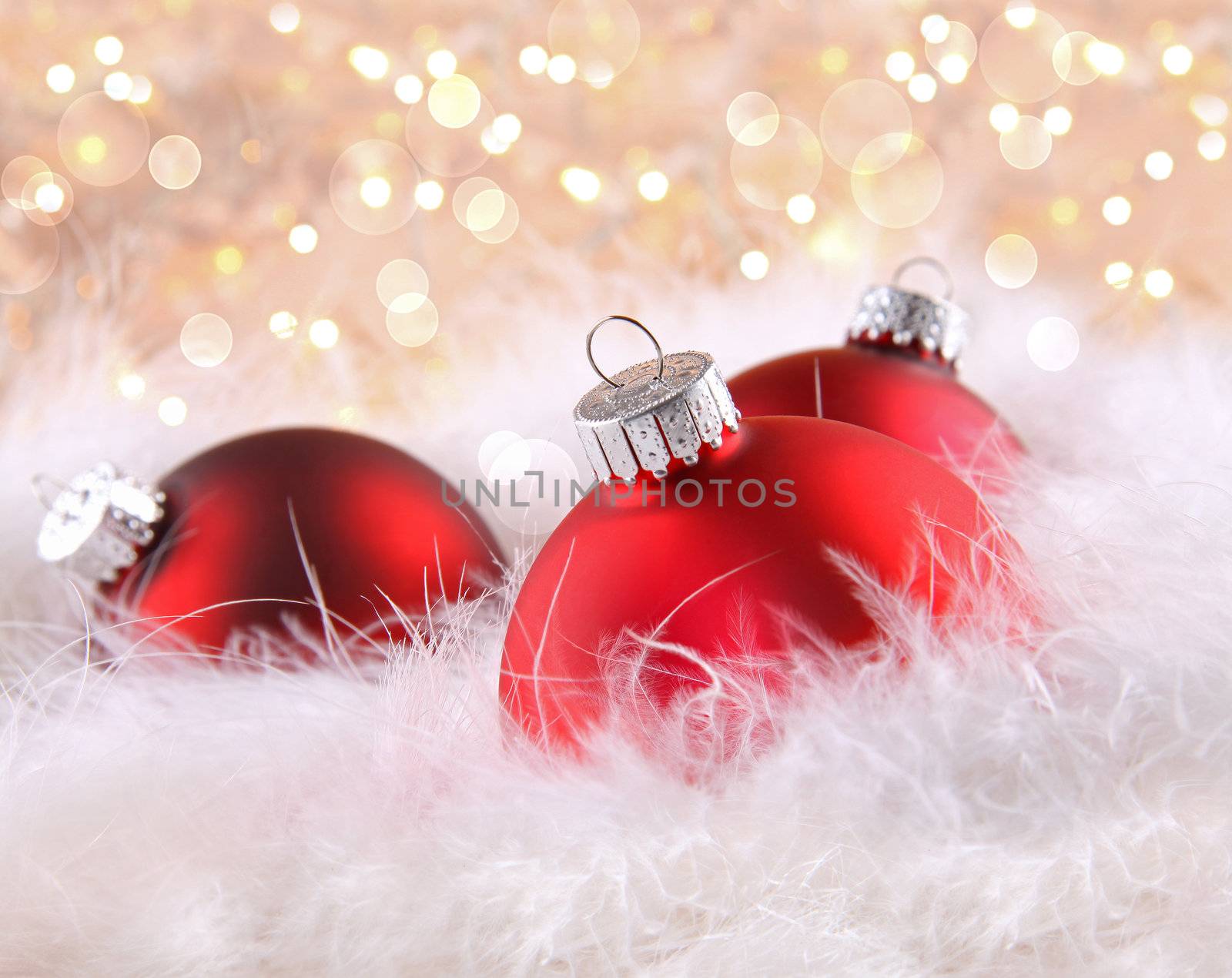 Red christmas balls with abstract light background