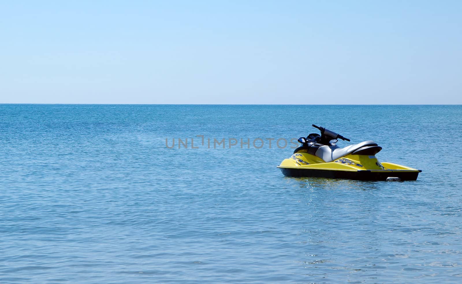 jet ski afloat in an open sea