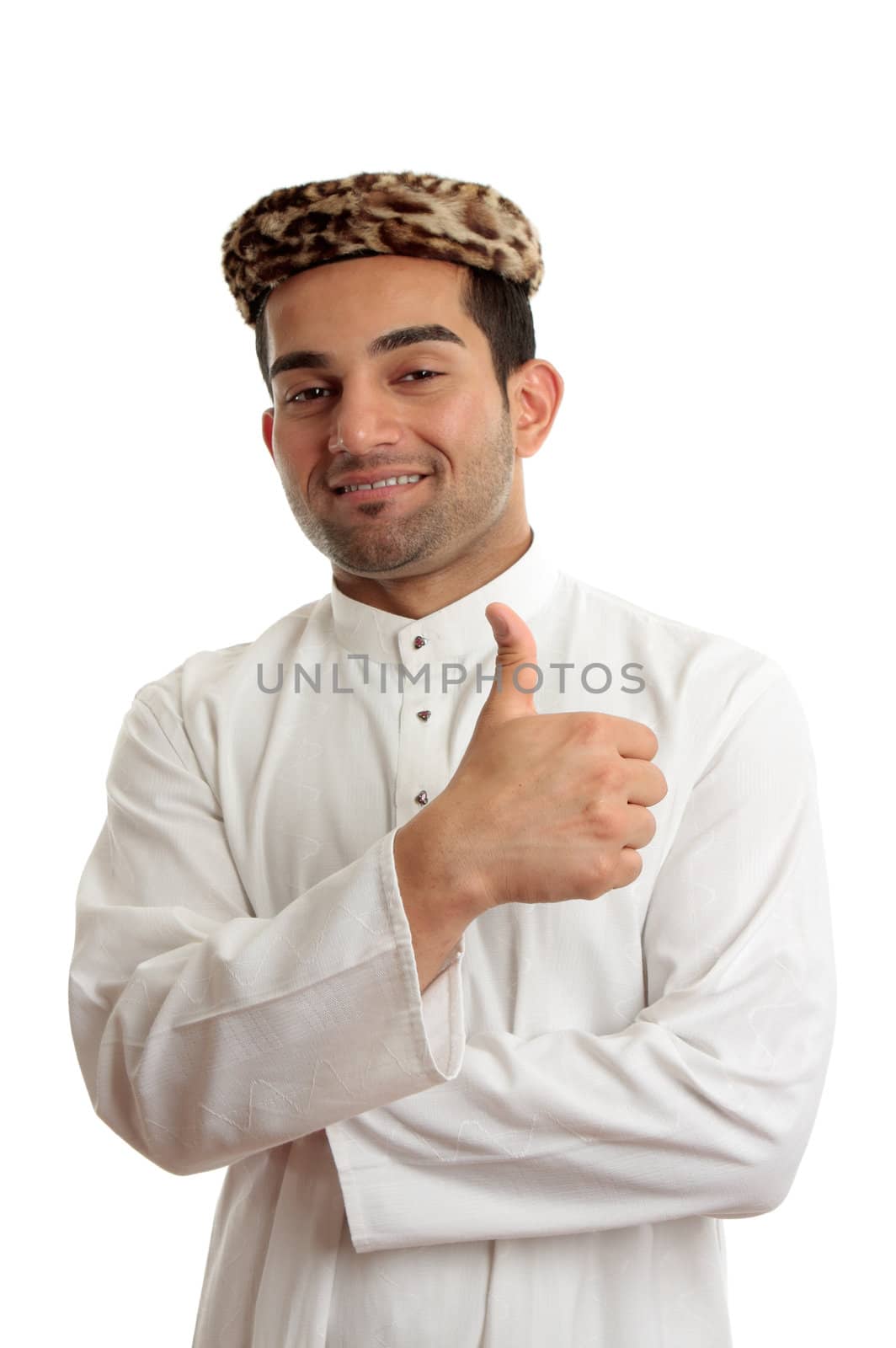 Ethnic mixed race man wearing a cultural clothing and vintage leopard skin topi hat.  He is smiling and giving thumbs up approval success.  White background.