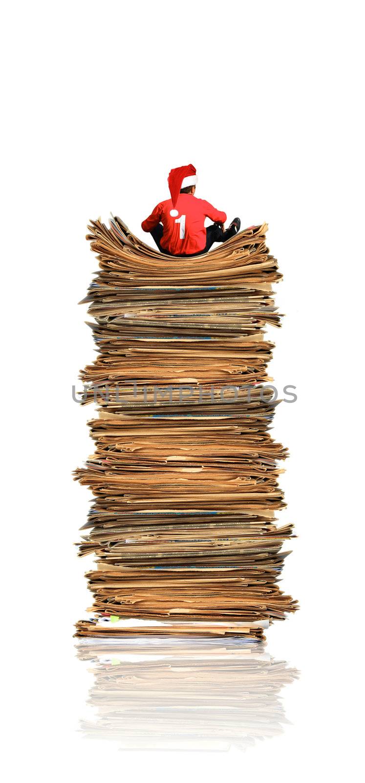 Student on heap of papers