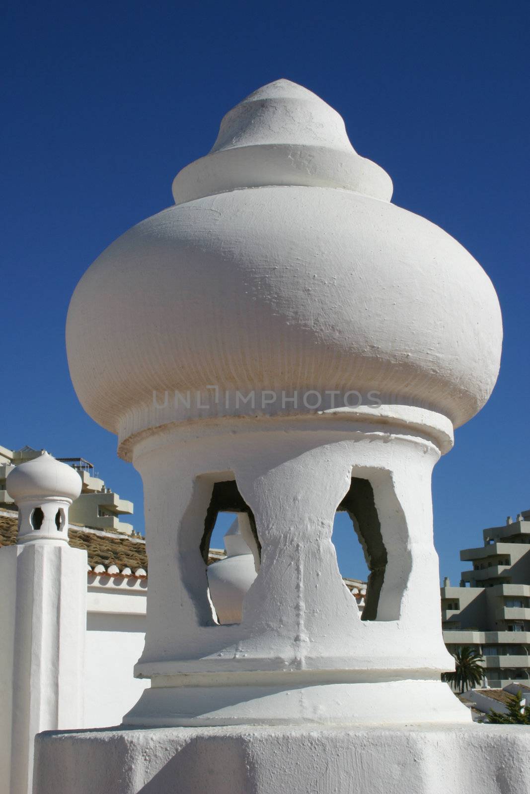 dome structure on a building painted white