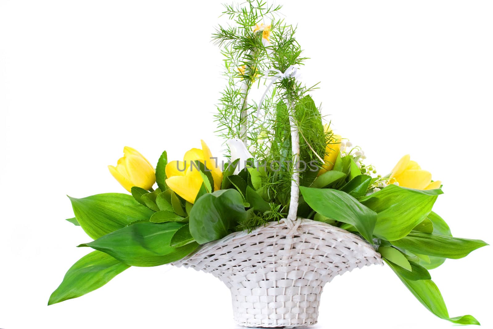 White basket full of tulips, with white pigeon and lilies of the valley.