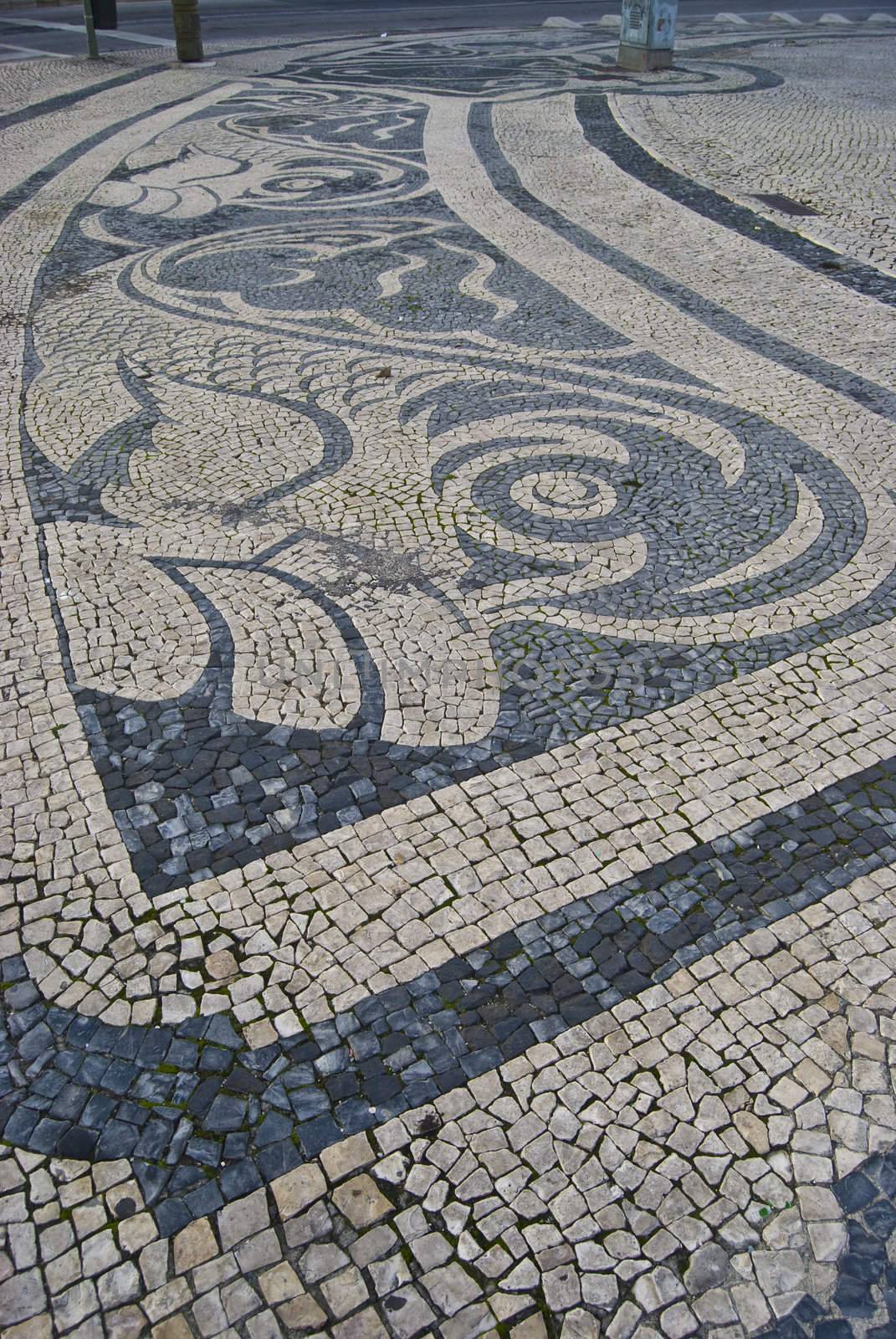 pavement showing fishes on the Praca do Comercio in Lisbon