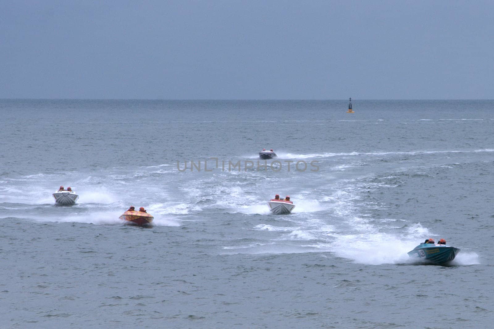Group of power boats racing